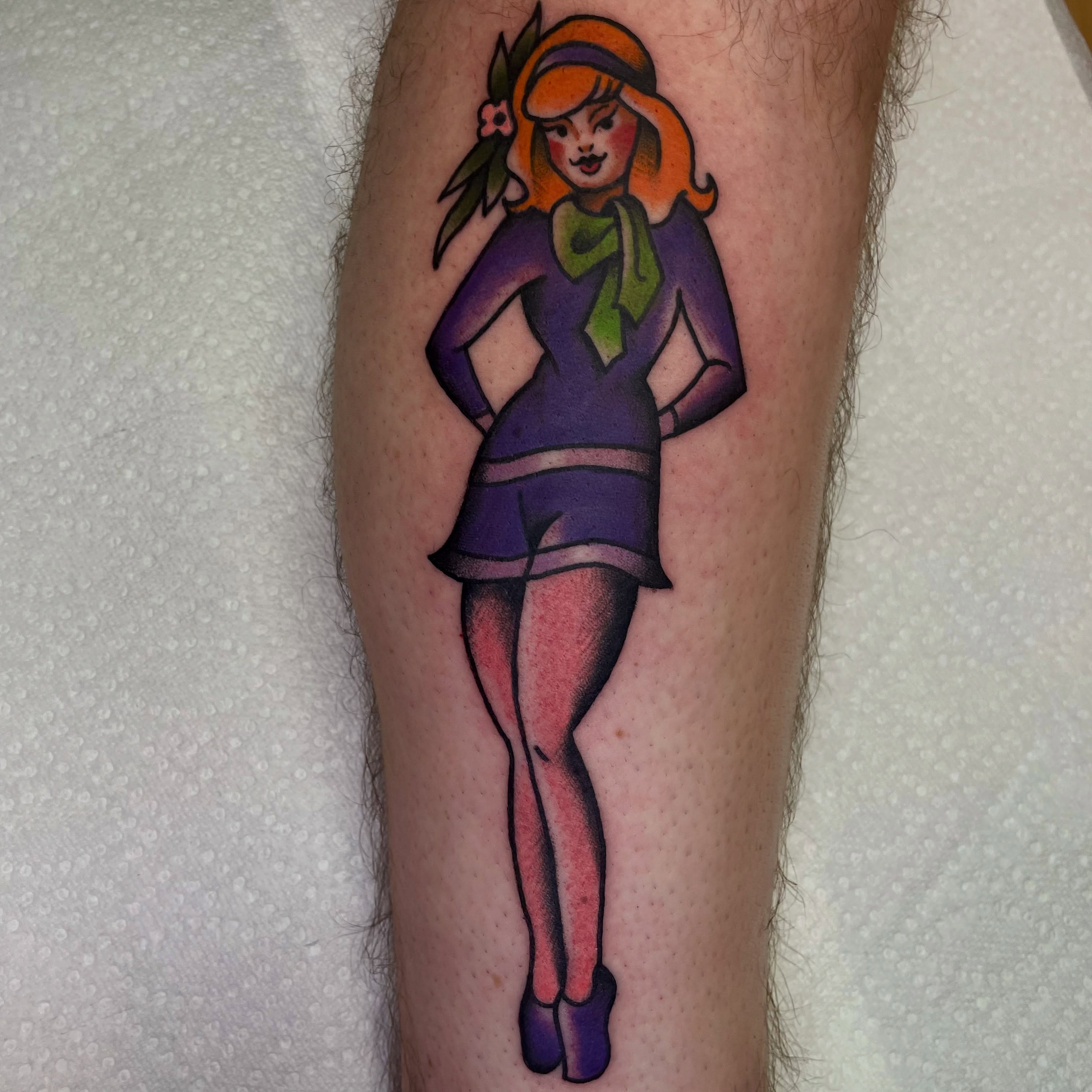 Janet jones American traditional tattoo on the thigh by Robert Morrow