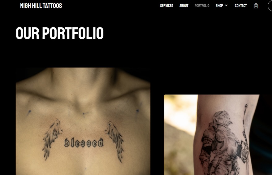 Wings and 'blessed' black and grey tattoo on the chest by Boise Tattoo Artist