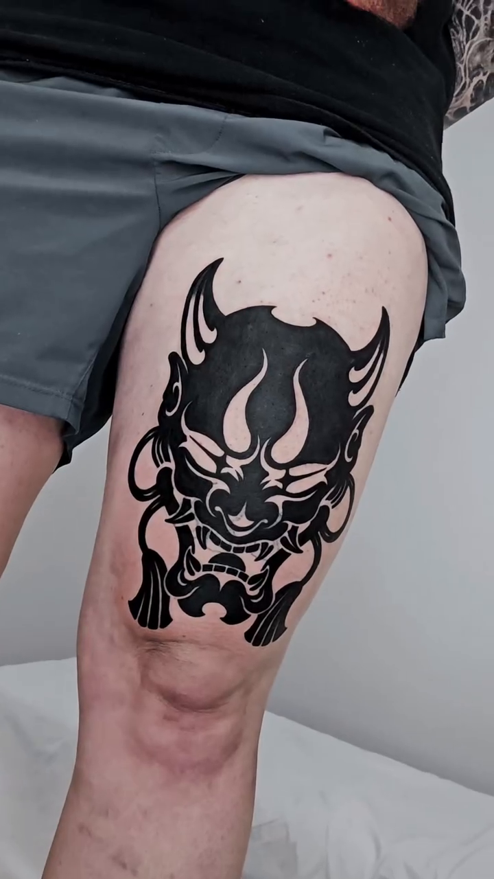 Oni mask blackwork tattoo by Jeremy "Jerms" Camposanto