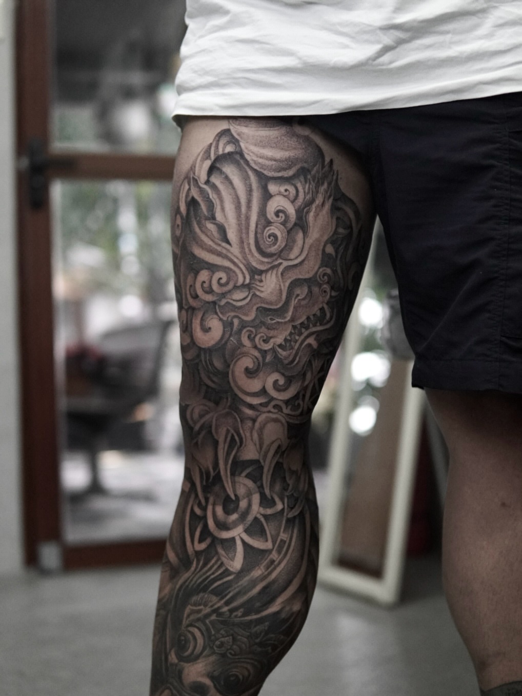 Dragon and lotus japanese irezumi tattoo on the thigh by Arhem Quiambao