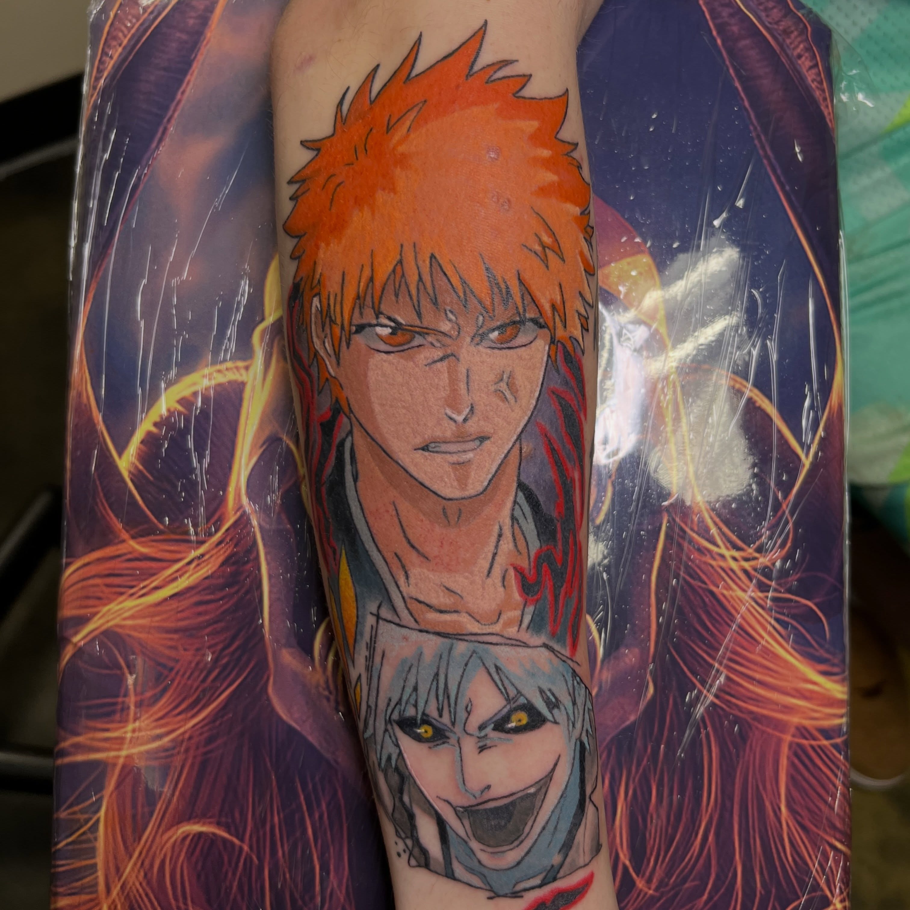 Anime characters anime tattoo on the forearm by Christopher Anderson-arnesen