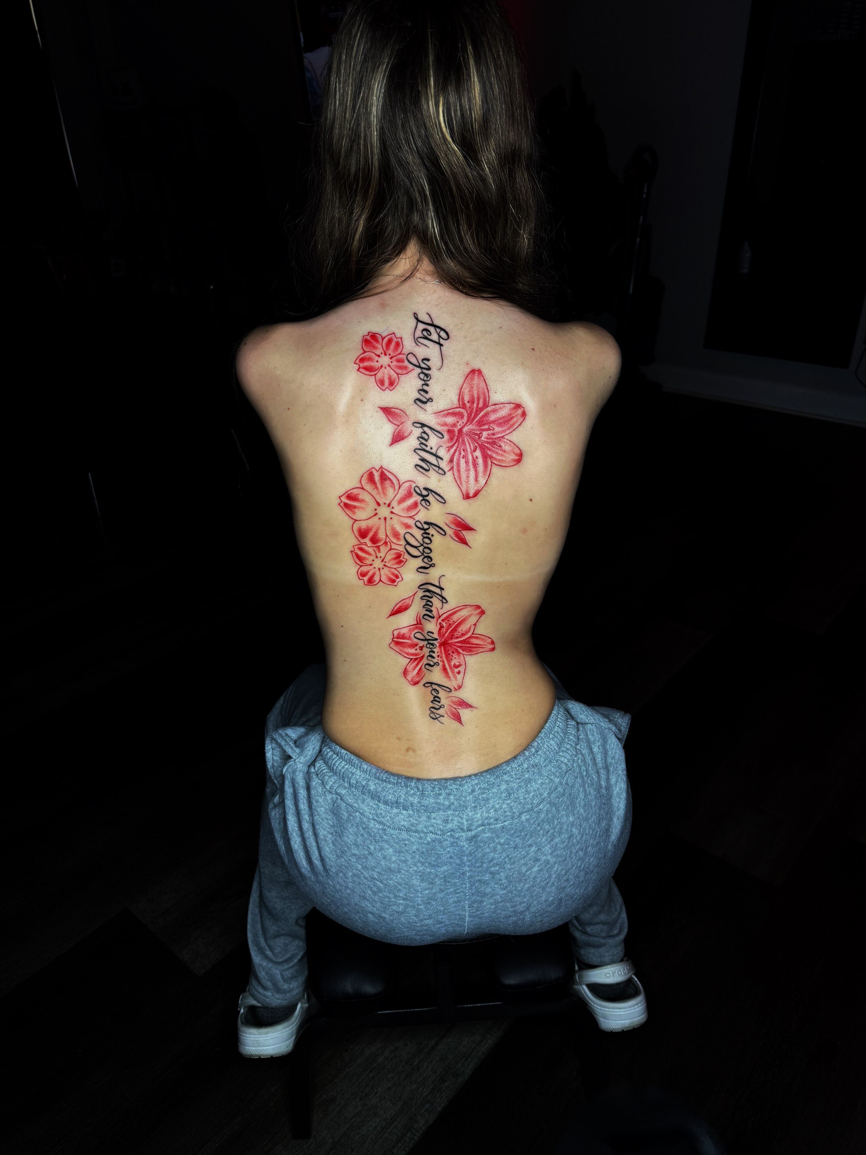 Flowers and inspirational quote dotwork tattoo on the back by Q⚜️
