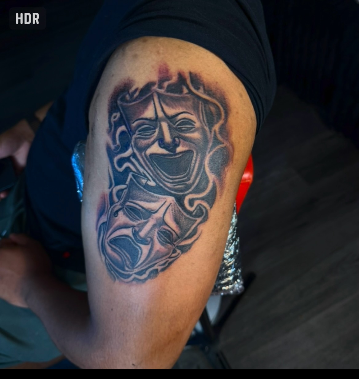 Mask black and grey tattoo on the forearm by Lamb, Philadelphia, Pennsylvania