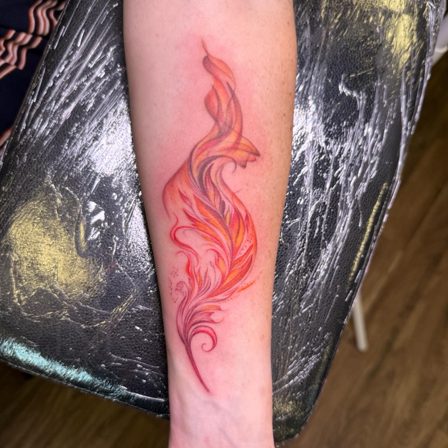 Flame new school tattoo on the forearm by PxINK, Crystal, Minnesota