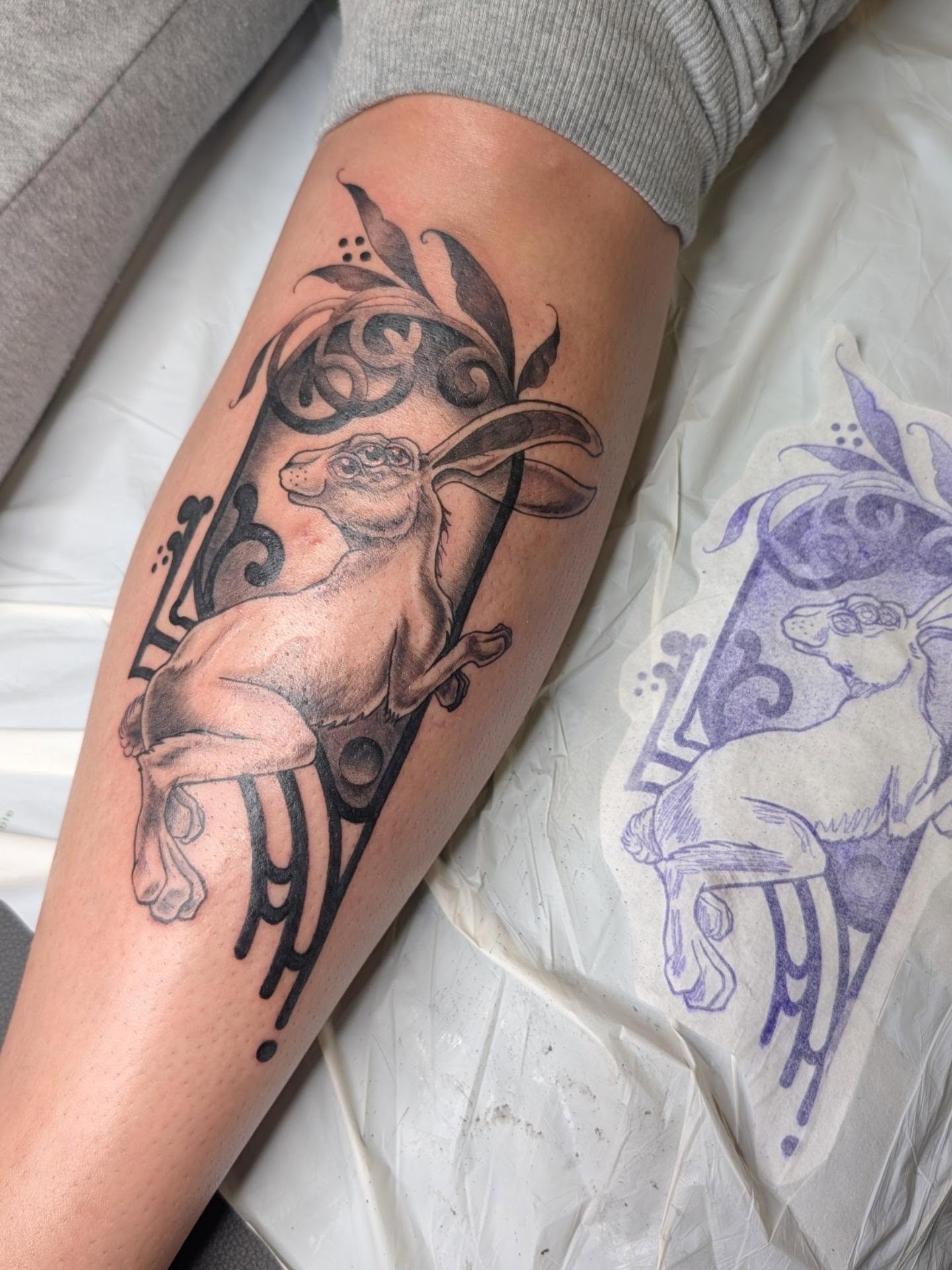 Goat black and grey tattoo on the forearm by Michaela May