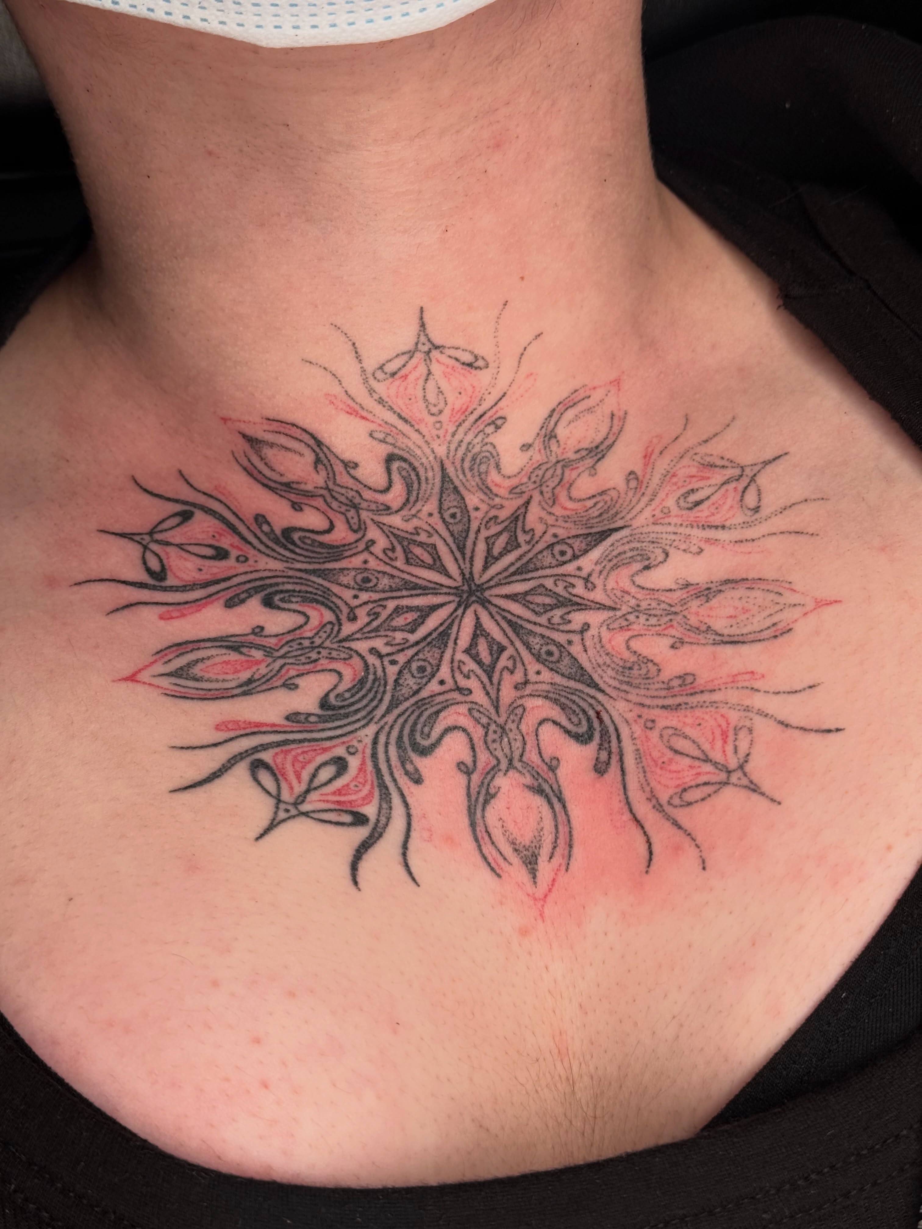 Floral mandala geometric tattoo on the neck by Handpoke Tattoo Artist, Minneapolis, Minnesota