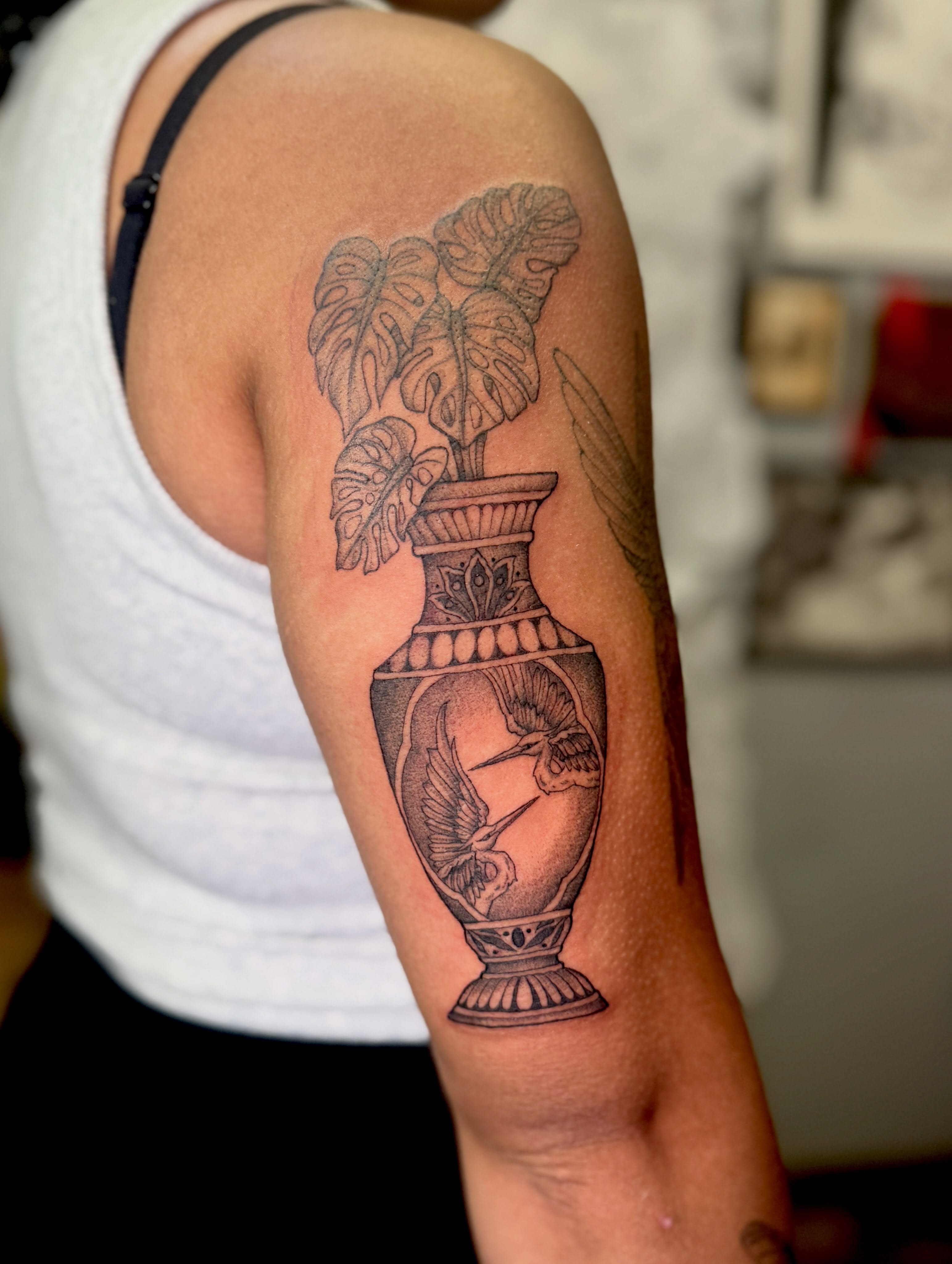 Urn with plant and hummingbird realism tattoo on the forearm by πβ¨ππ₯π’π©ππΆ β¨π