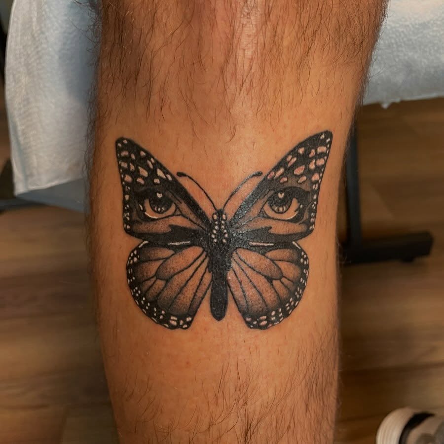 Monarch butterfly dotwork tattoo on the forearm by Avalon Sable