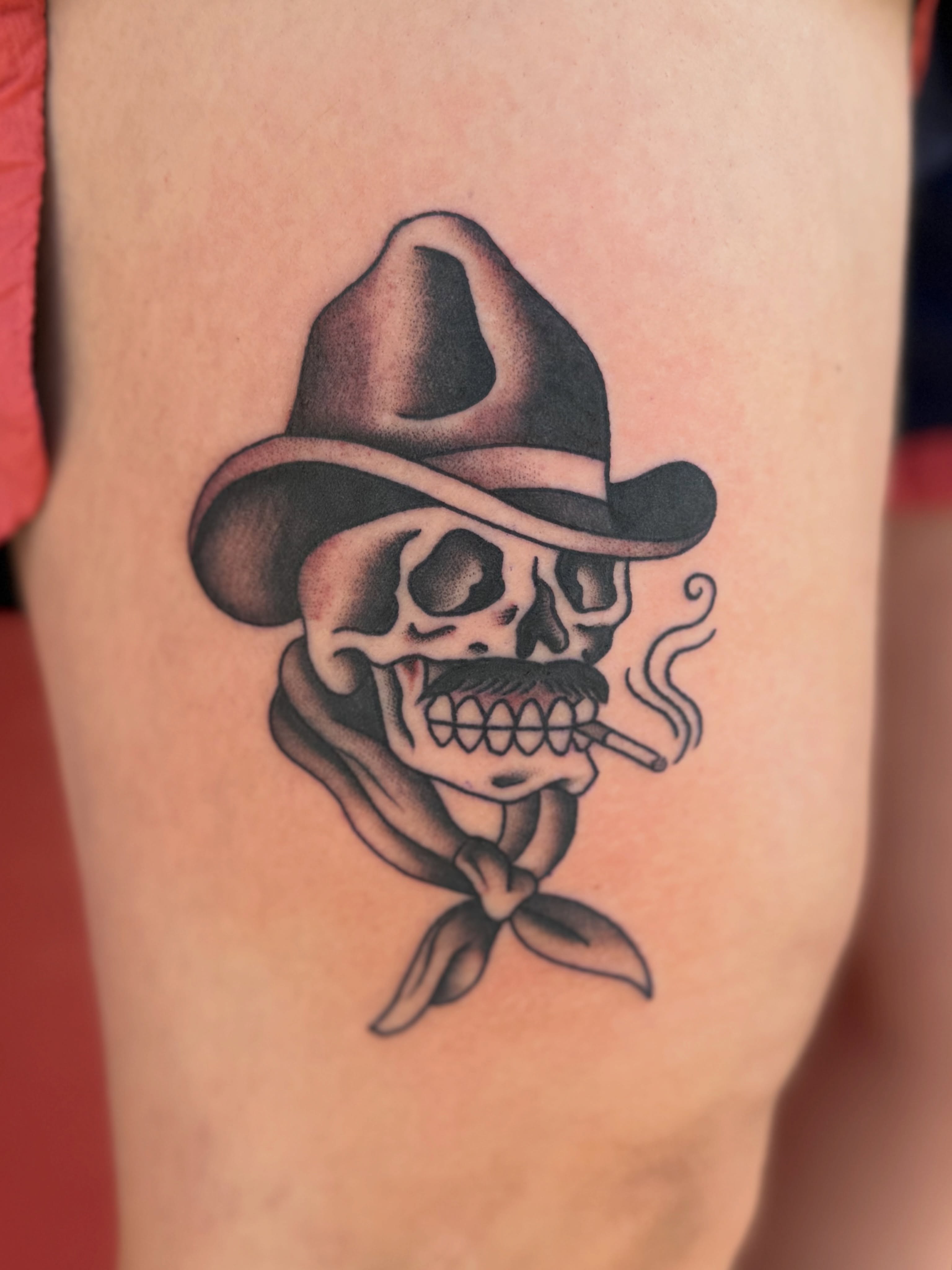 Cowboy skull American traditional tattoo on the thigh by Sophie McTear