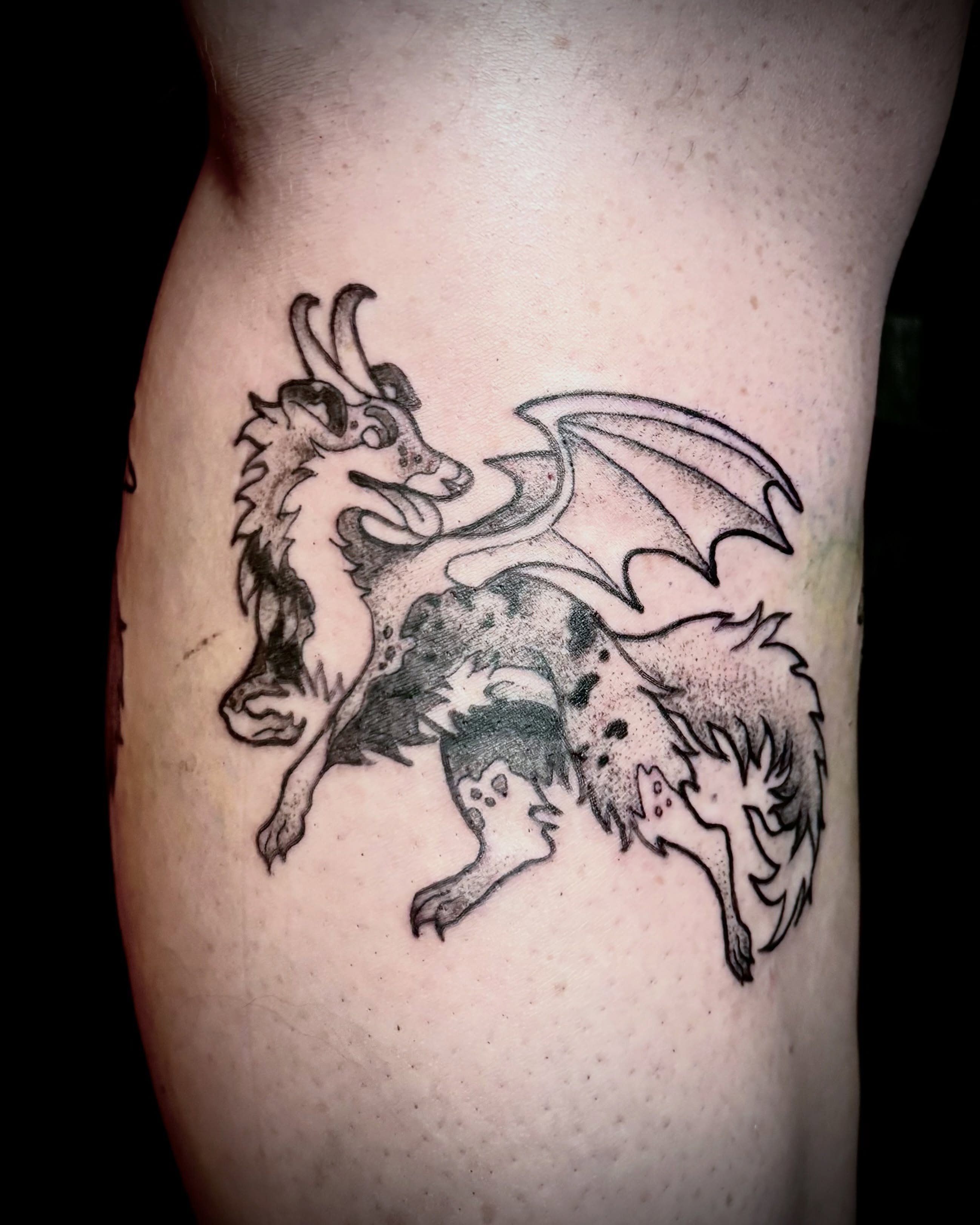 Dragon dotwork tattoo on the thigh by Abby Ruok, Midvale, Utah