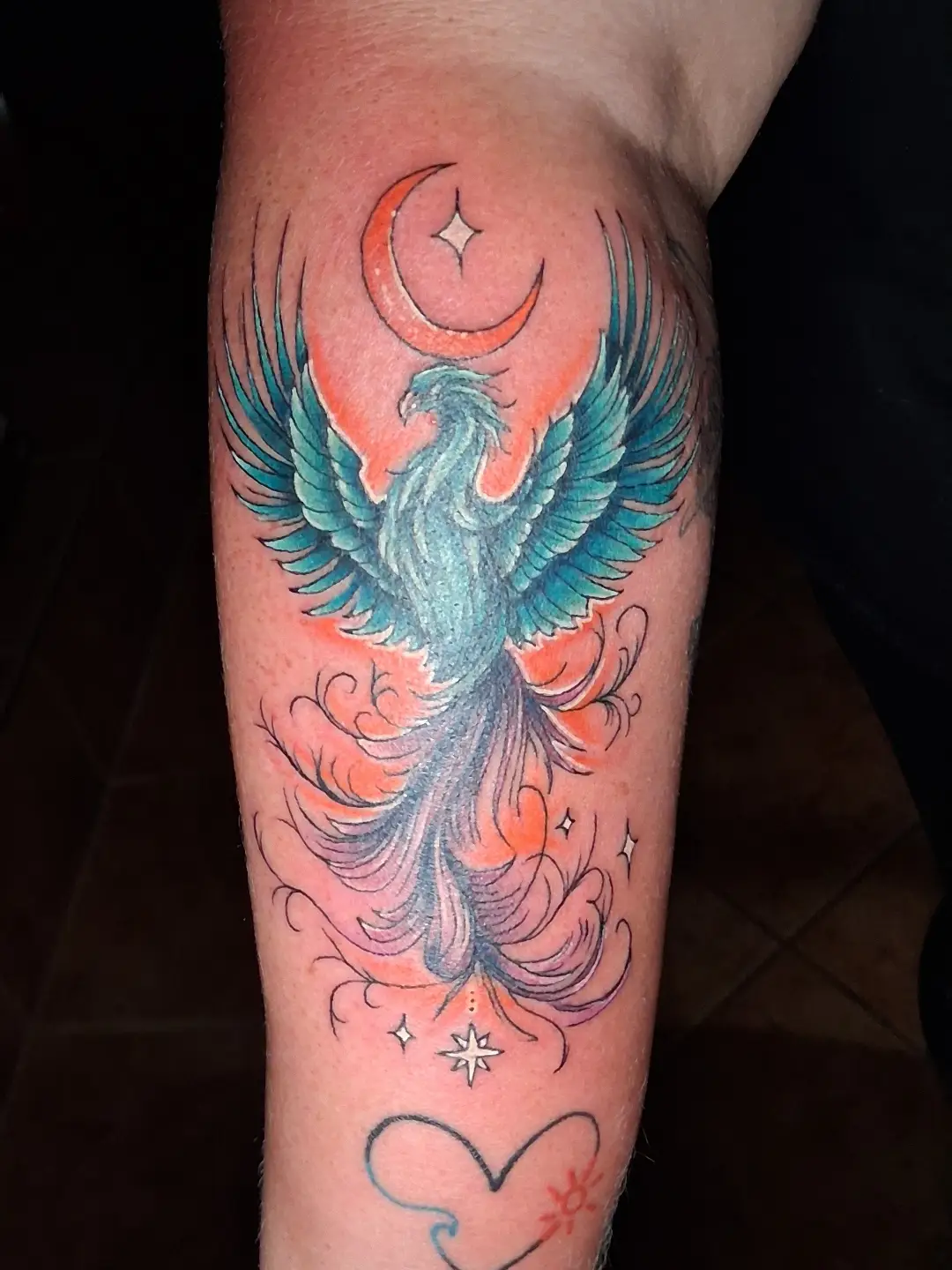 Phoenix neo-traditional tattoo on the forearm by Dave Johnson, Billings, Montana