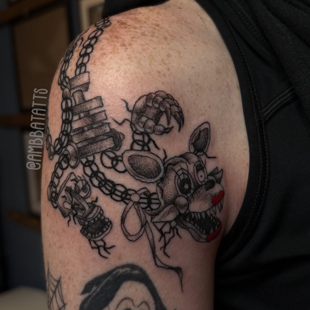 Freddy Fazbear black and grey tattoo on the shoulder by amber brady, Brunswick, Ohio