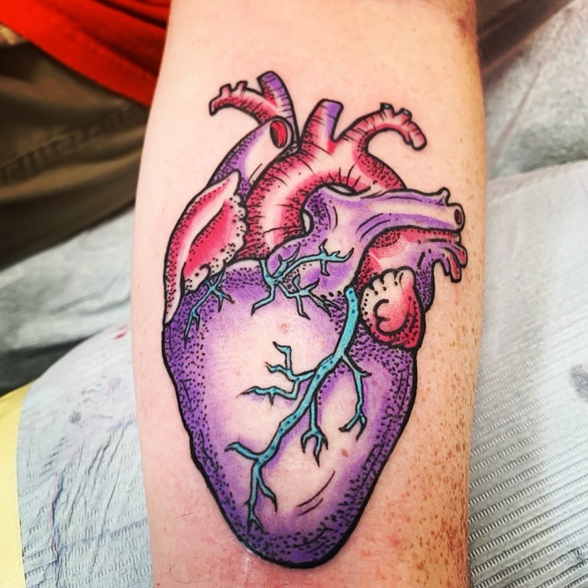 Anatomical heart realism tattoo on the forearm by El Kapitan