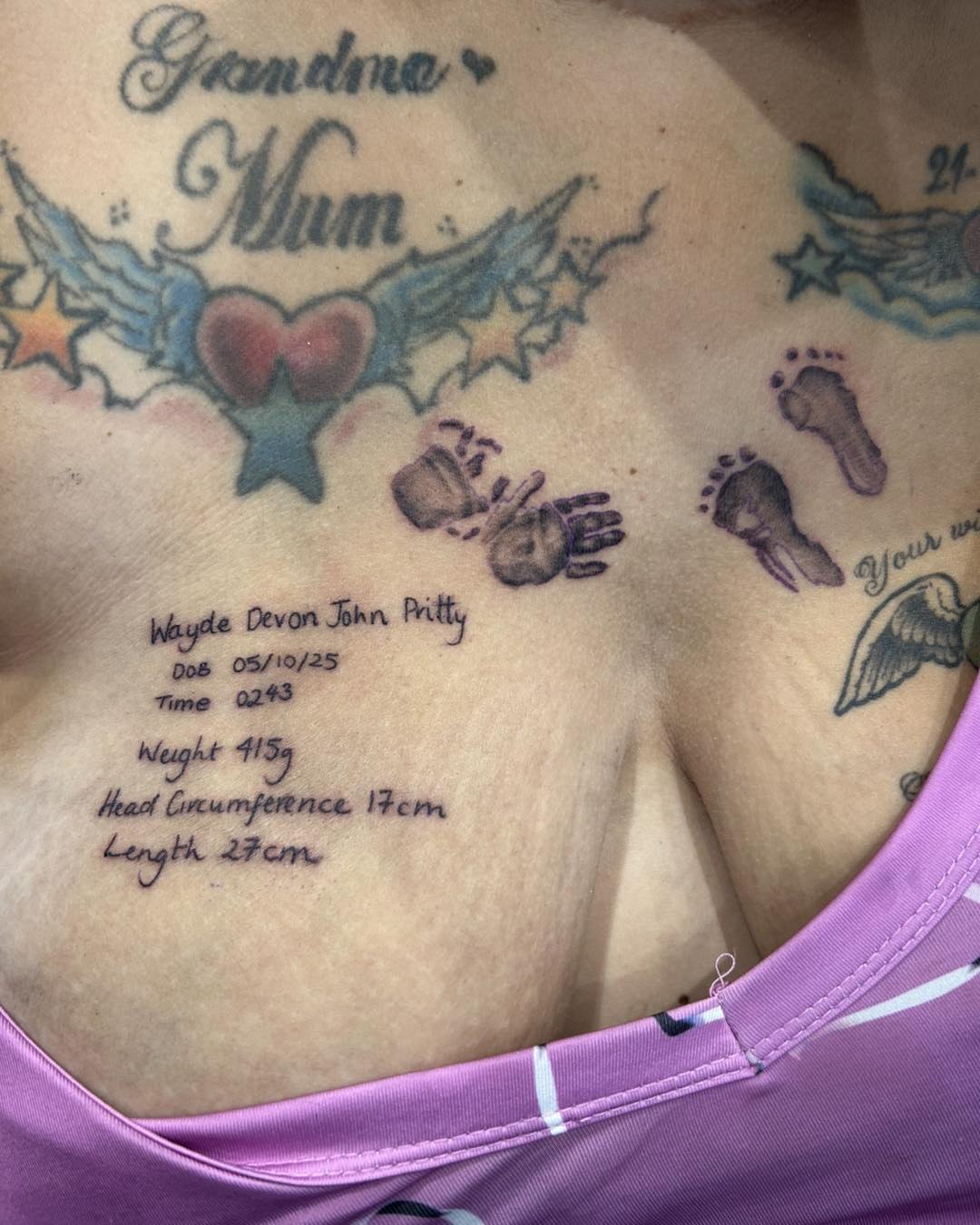 Baby stats black and grey tattoo on the chest by Room 5 Tattoo