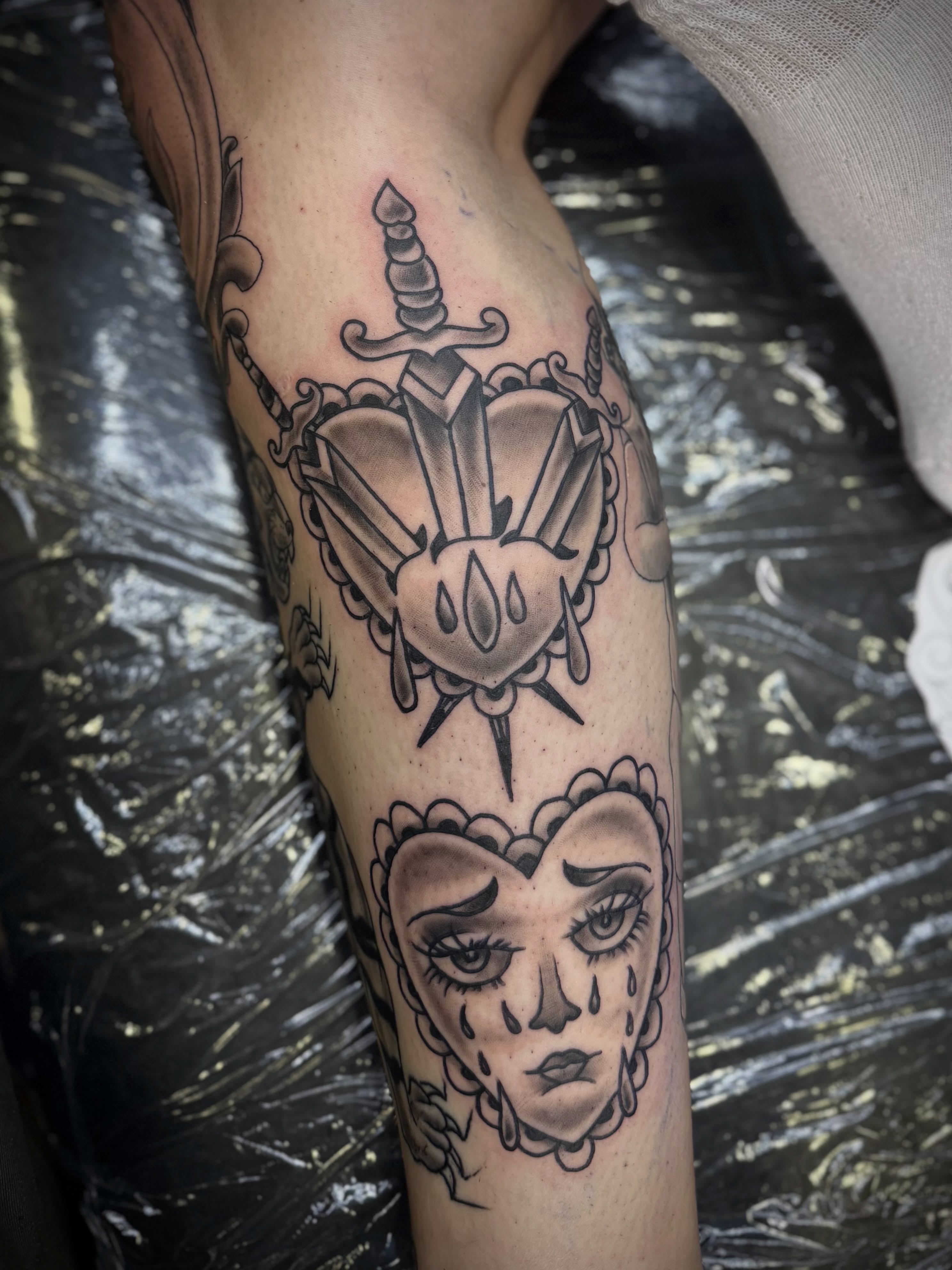 Woman's face with tears American traditional tattoo on the forearm by David C. McGhee