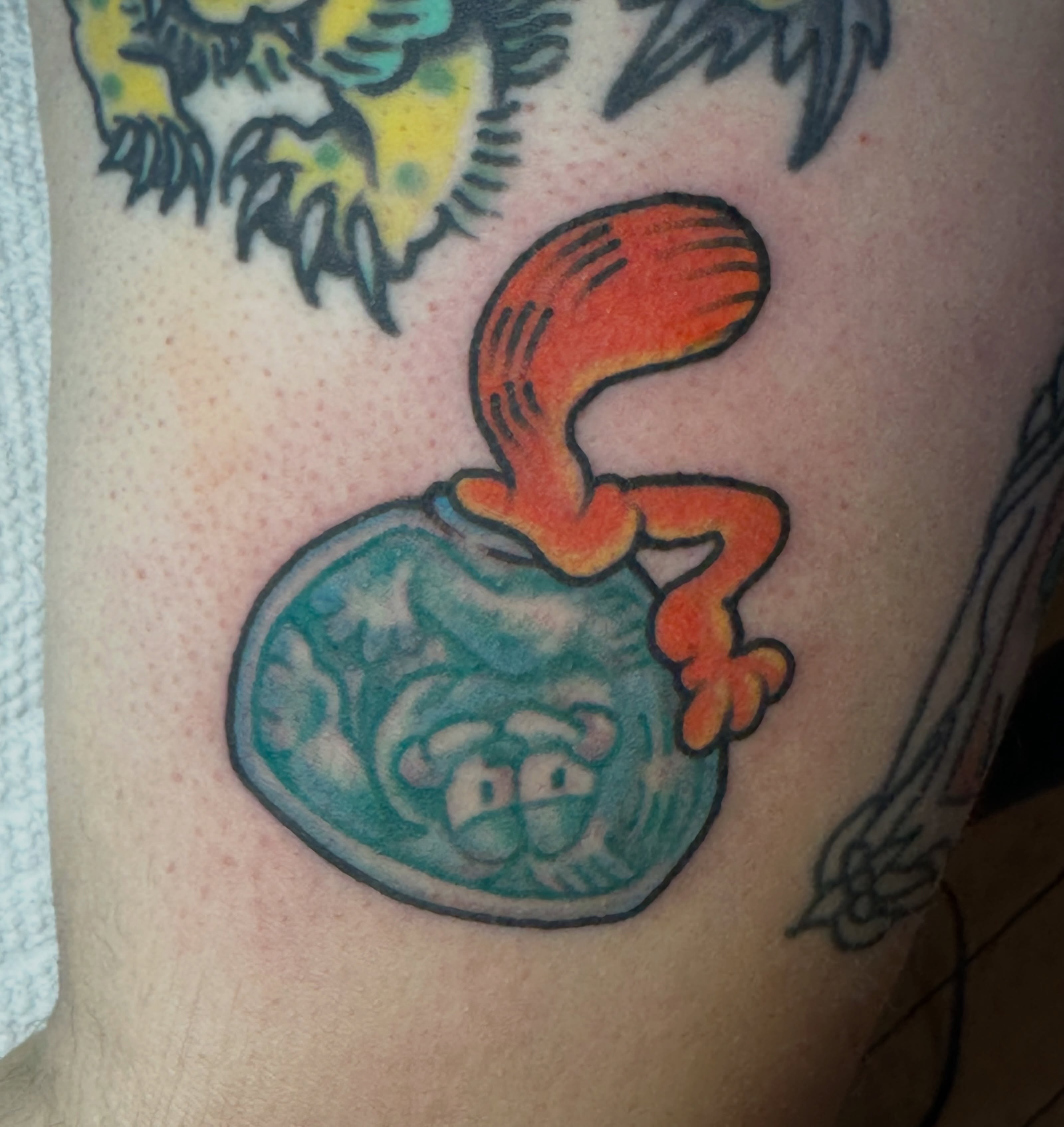 Monkey in bowl American traditional tattoo on the forearm by Providence Tattooer