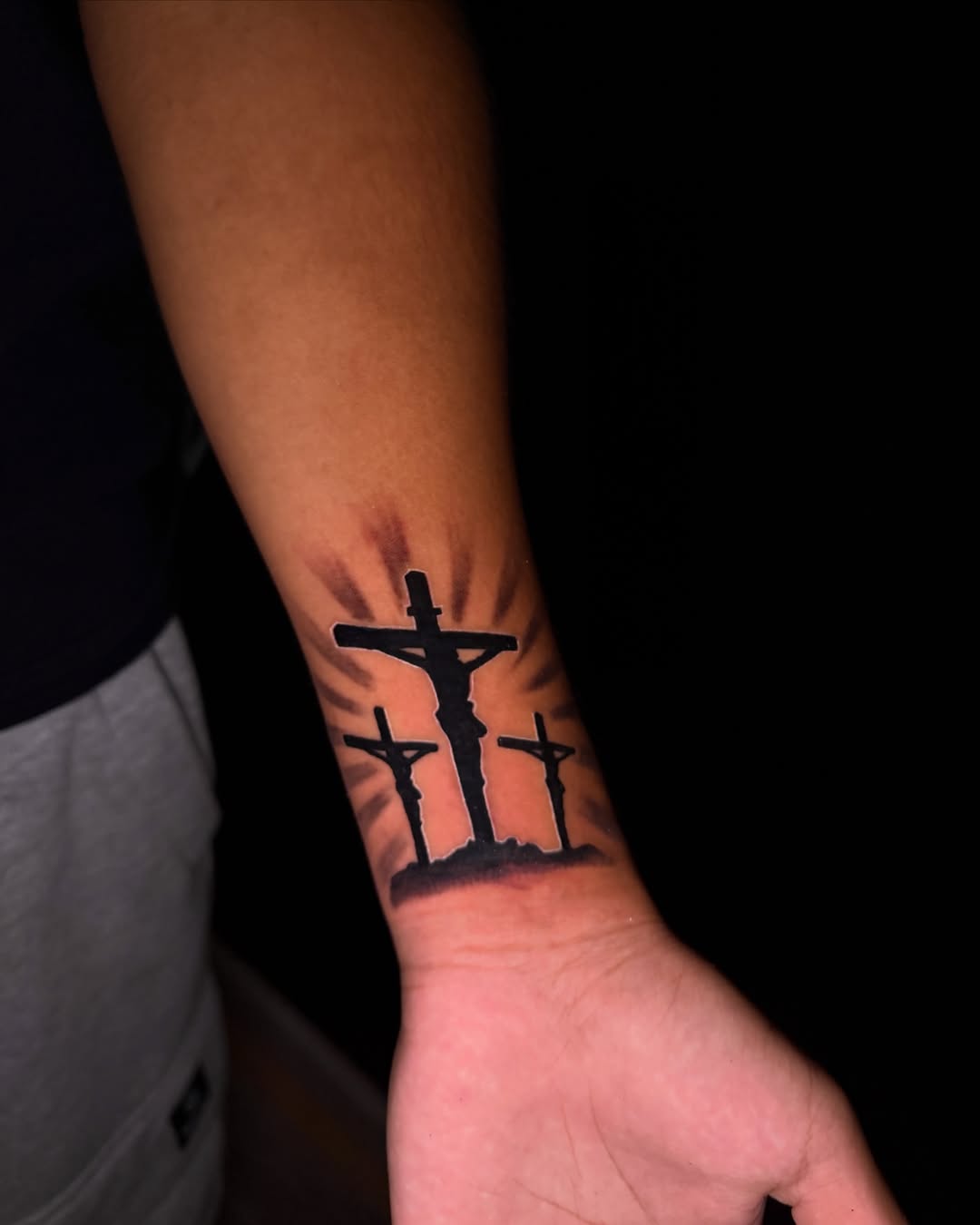 Three crosses black and grey tattoo on the forearm by ๐๐ข๐ฃ๐ฑ ๐๐ฆ๐ฑ๐ฌ ๐๏ธ