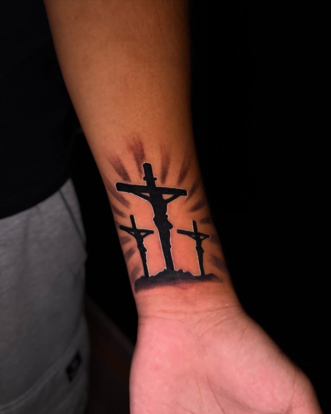 Crucifixion scene black and grey tattoo on the forearm by ๐๐ข๐ฃ๐ฑ ๐๐ฆ๐ฑ๐ฌ ๐๏ธ
