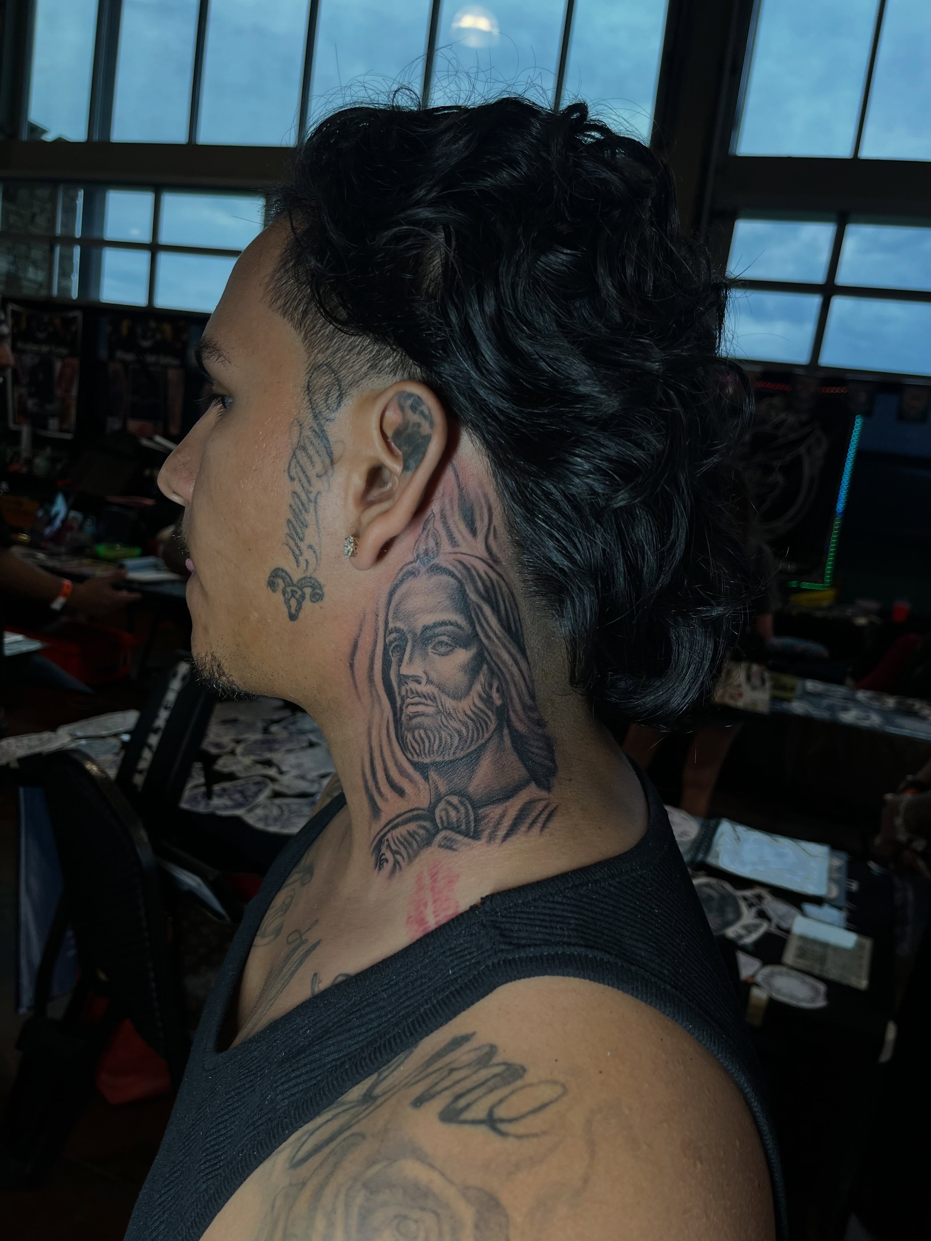 Bearded man black and grey tattoo on the neck by DFW