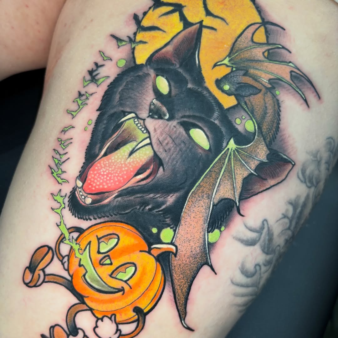 Bat and pumpkin dotwork tattoo on the forearm by Matt Stolzenburg