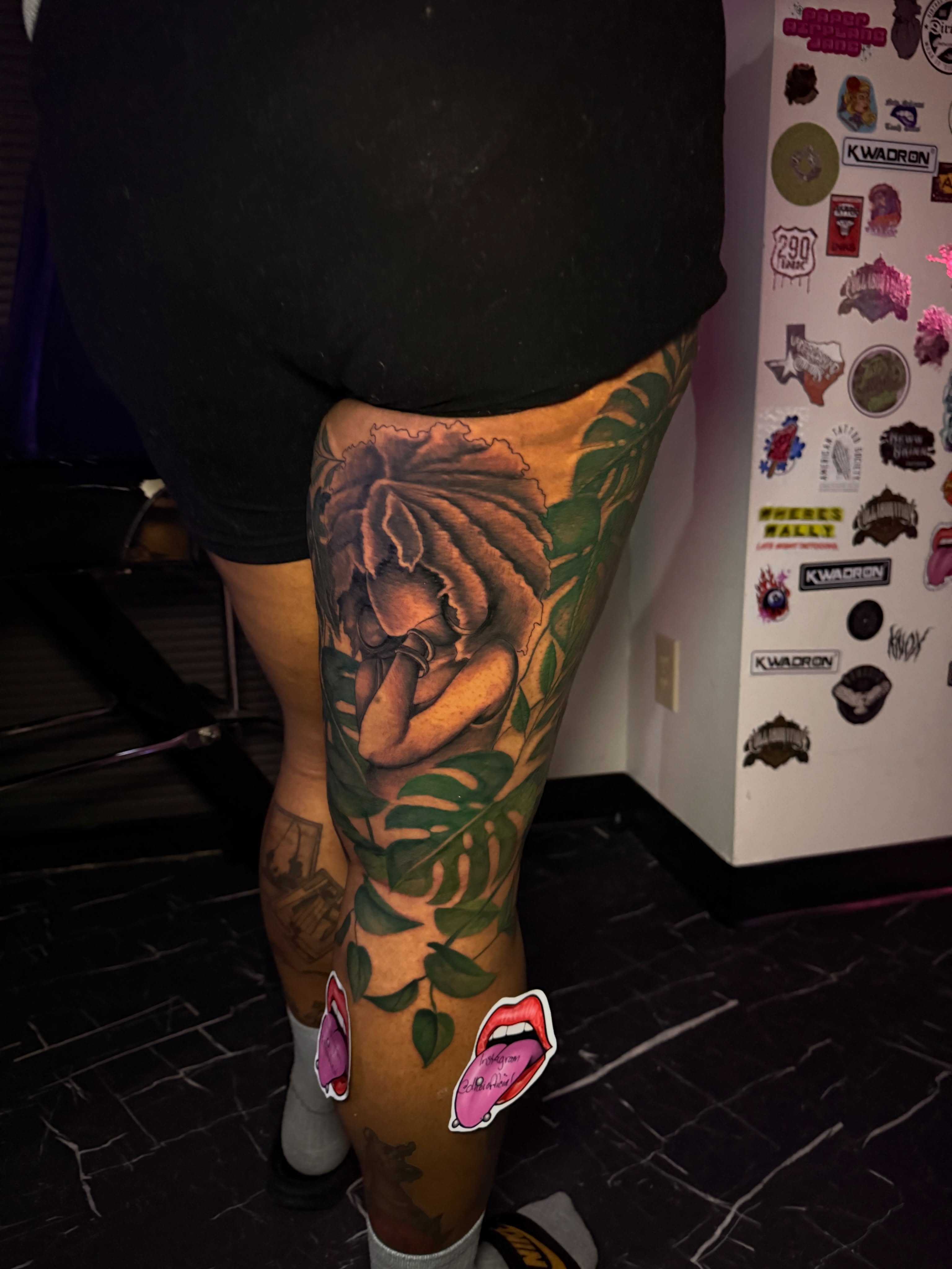 Rose realism tattoo on the thigh by Doll The Tattoo Artist, Addison, Texas