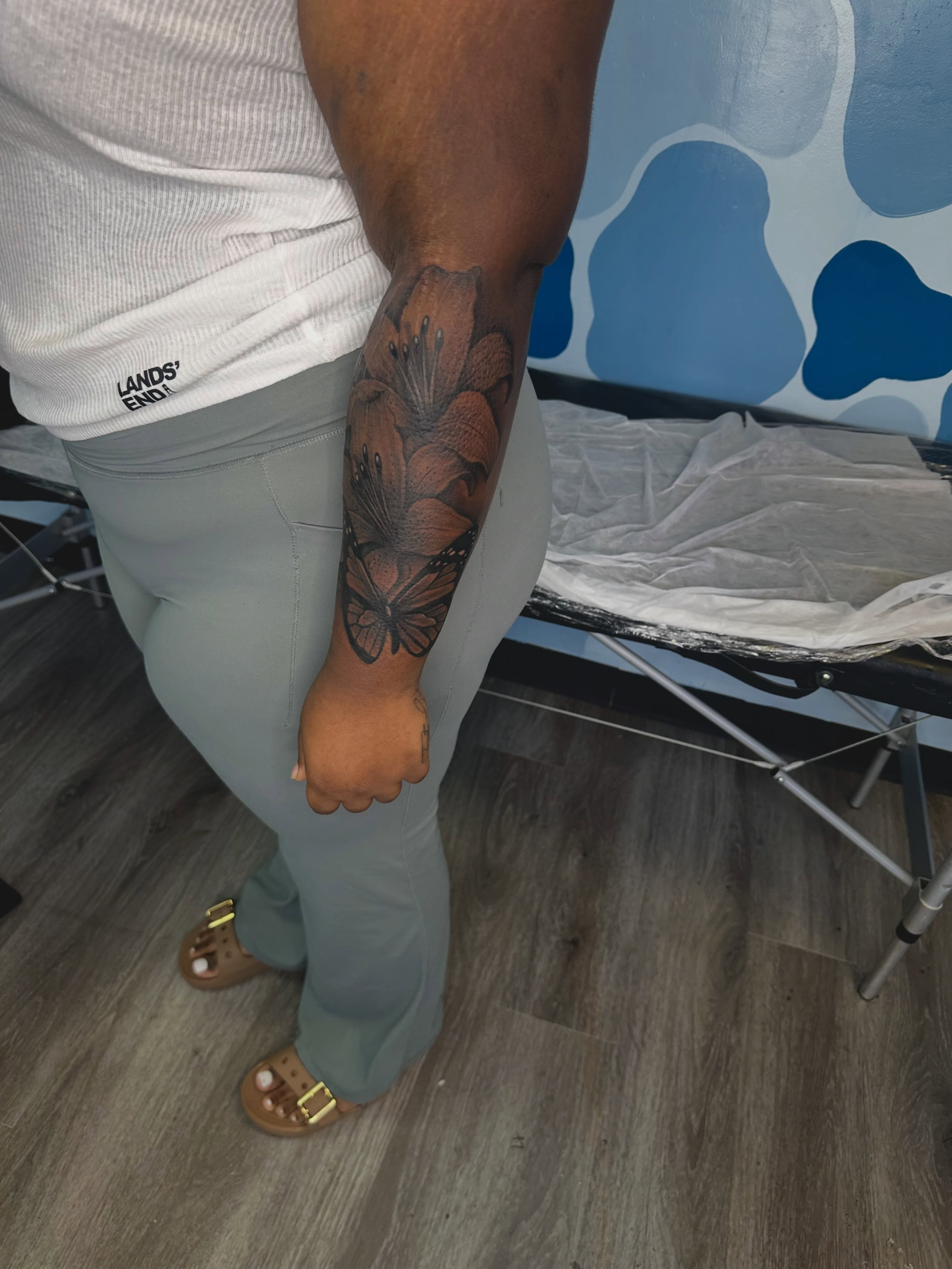 Flower black and grey tattoo on the forearm by Sierra 🩷