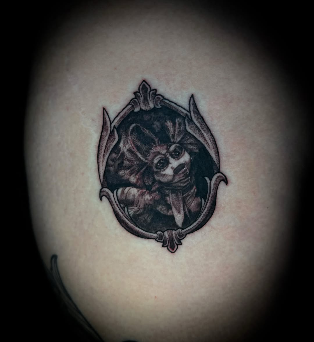 Yoda black and grey tattoo on the shoulder by Savannah Duff