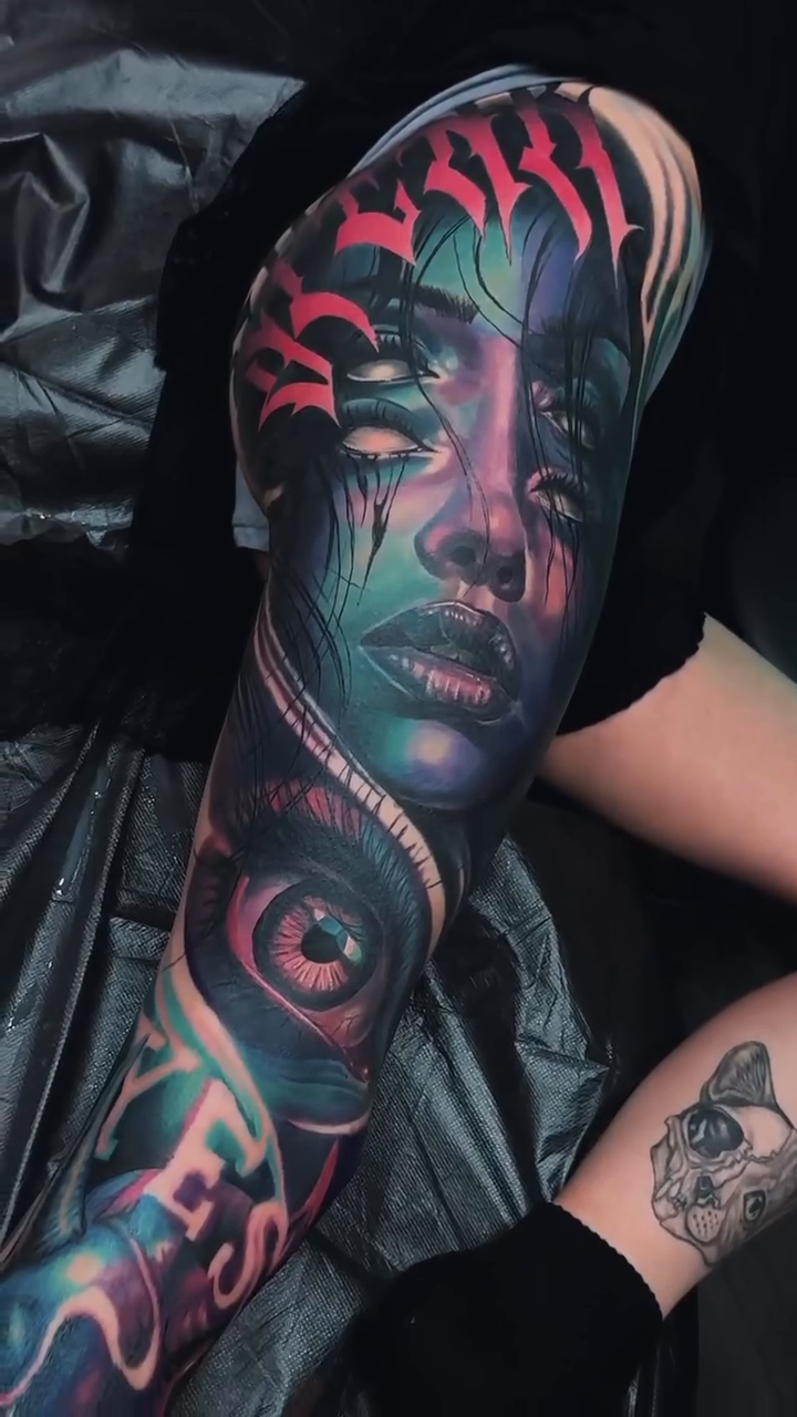 Surreal portrait with eyes and script realism tattoo by Zac Pedrosa
