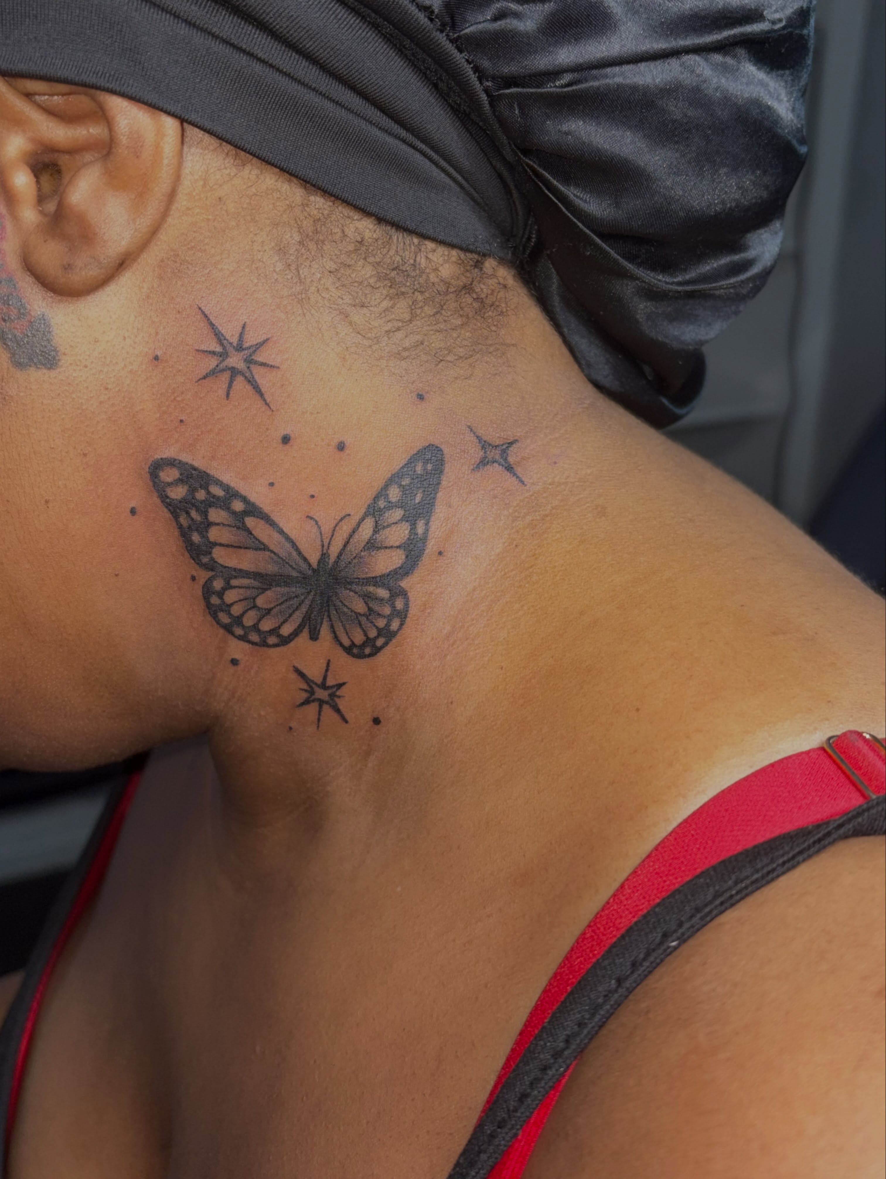 Butterfly dotwork tattoo on the neck by 216 Tattoos 🥰