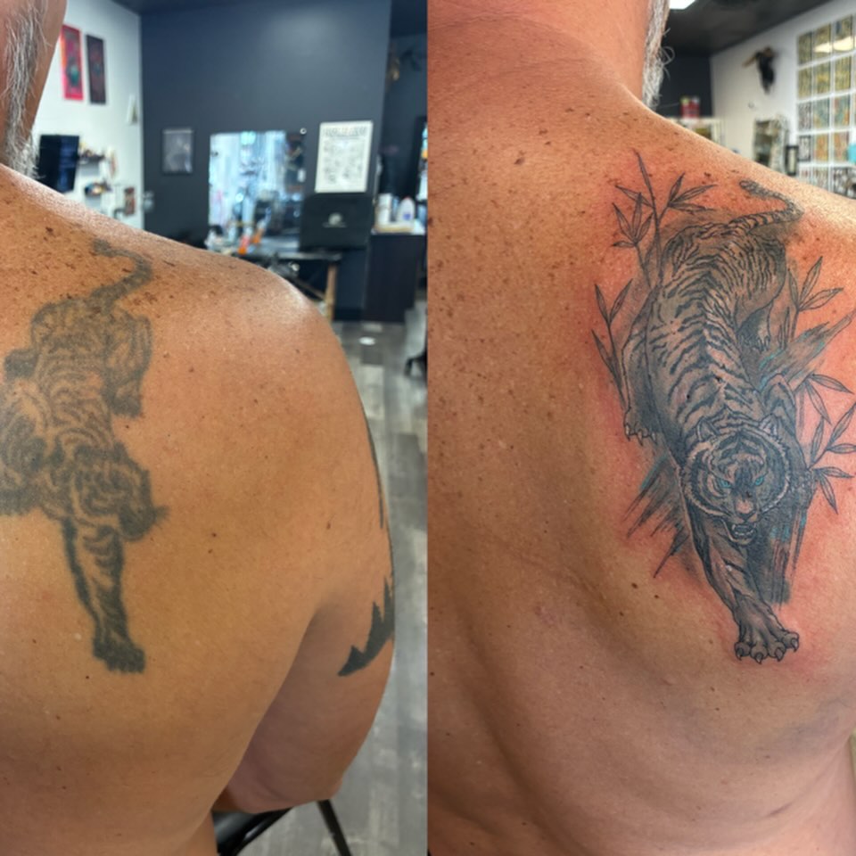 Tiger black and grey tattoo on the shoulder by Hit & Run Tattoo, Dayton, Ohio