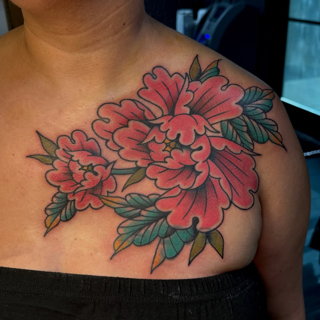 Peony flowers American traditional tattoo on the chest by Traddy Maddie ๐