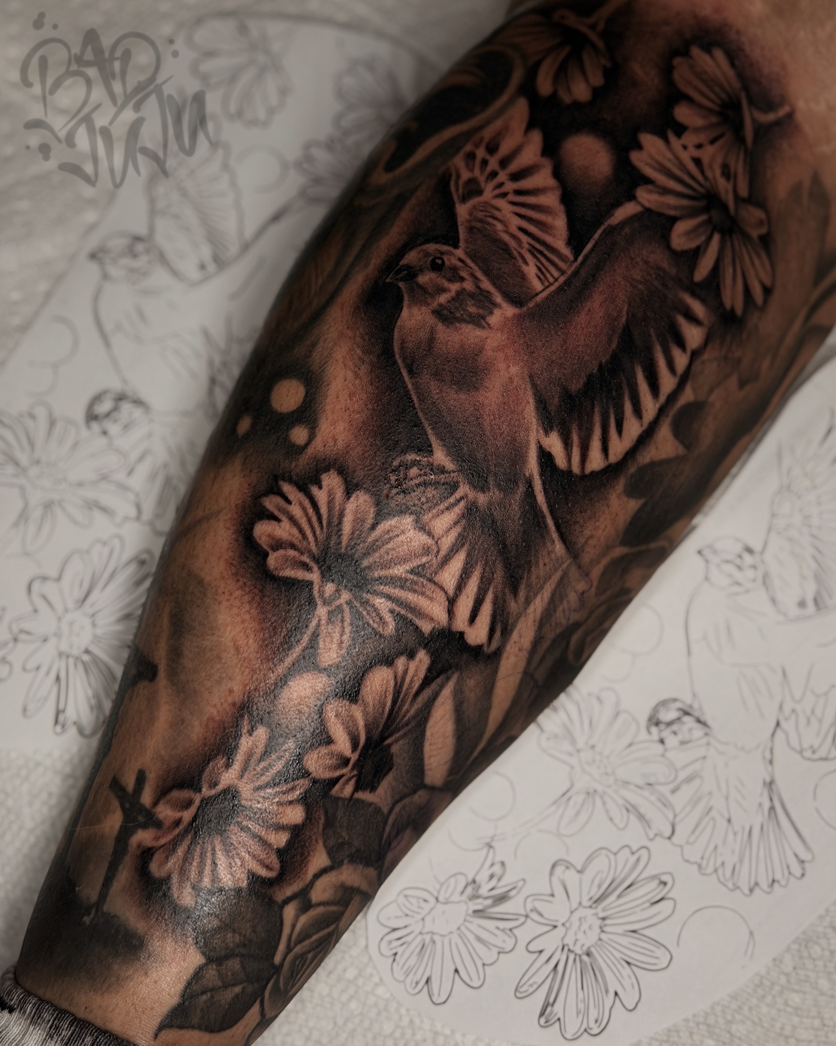 Bird and flowers realism tattoo on the forearm by 💞Juju💕
