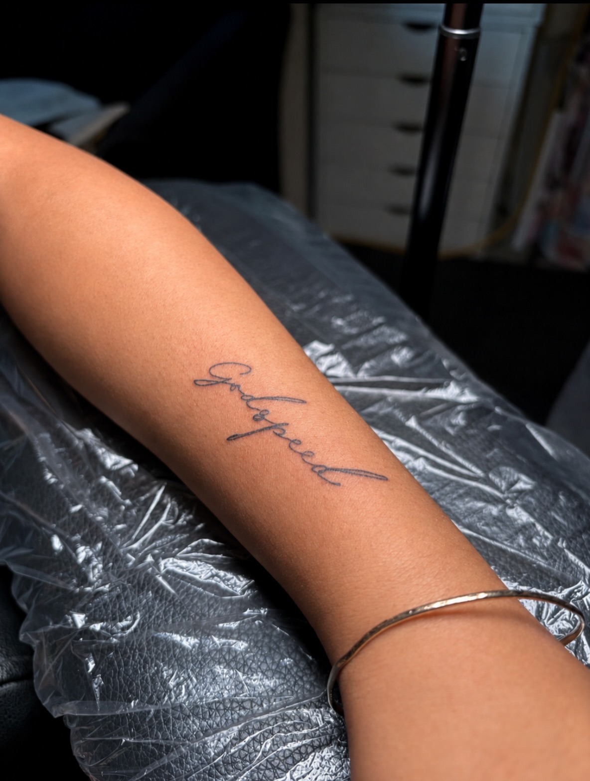 Godspeed lettering script tattoo on the forearm by Cece, Las Vegas, Nevada