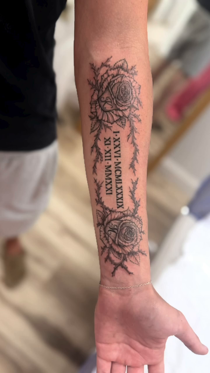 Rose and roman numerals fine line tattoo by Ink About Me - Amanda’s Fine Lines