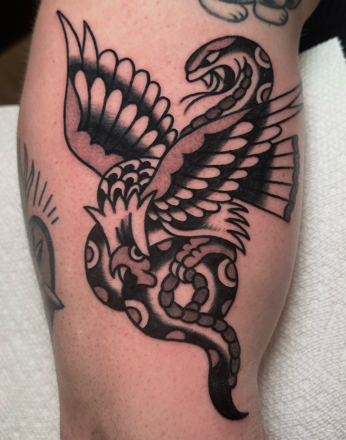 Dragon black and grey tattoo on the forearm by Zahra Niedermann