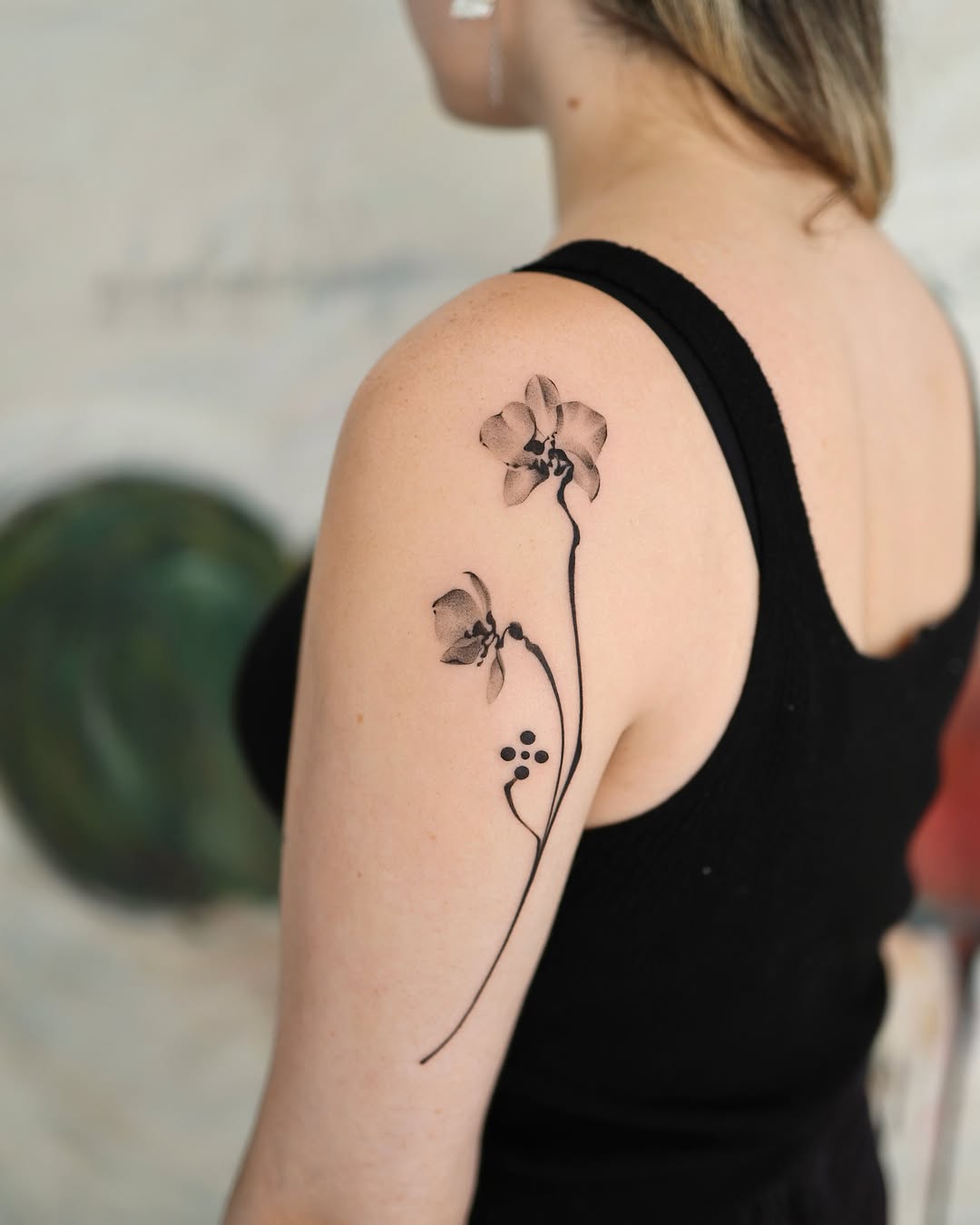 Flowers dotwork tattoo on the shoulder by River, New York, New York