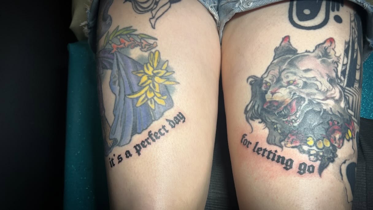 Flower and angel American traditional tattoo on the forearm by Tattoo Kayla