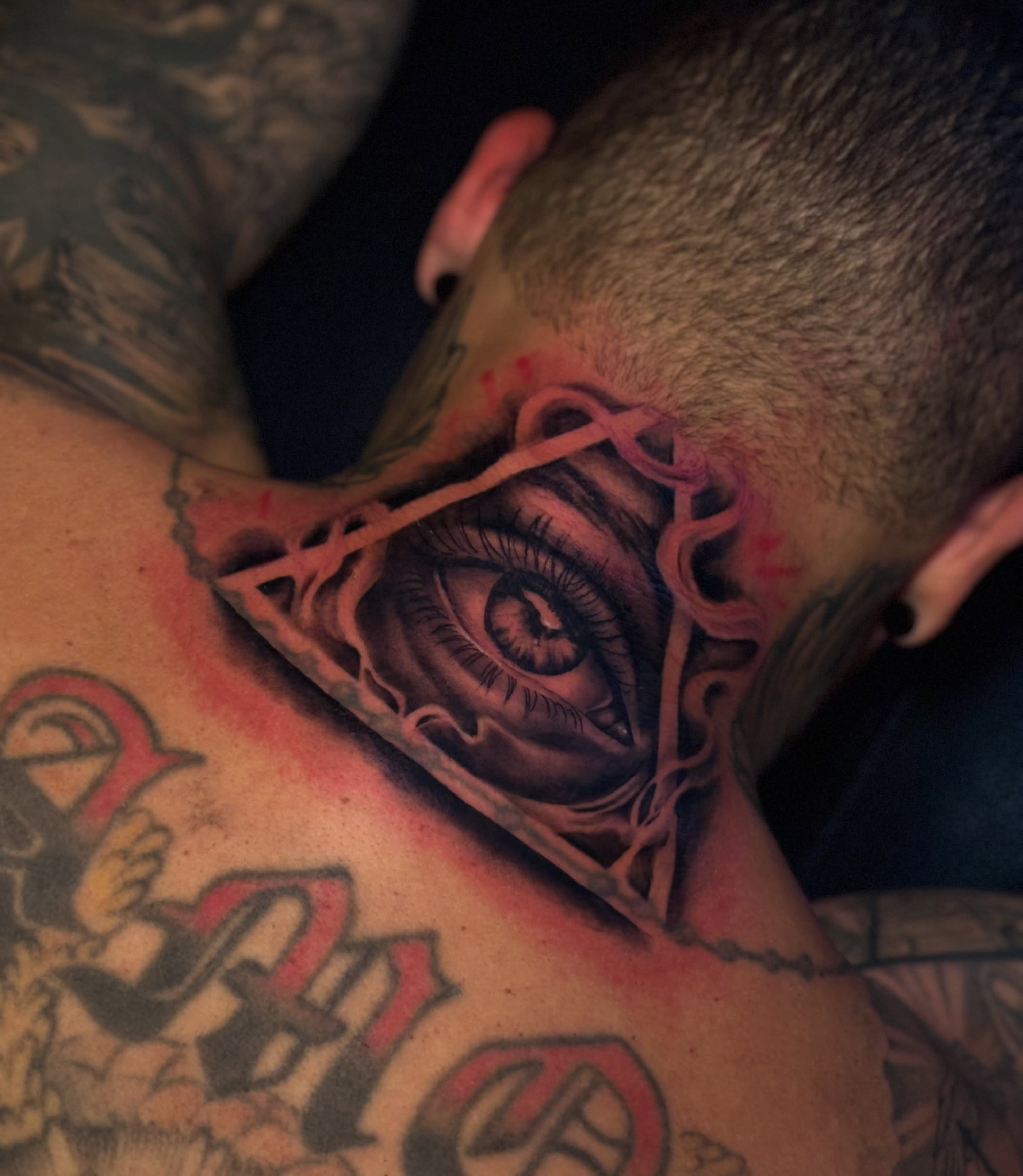 Eye realism tattoo on the neck by Bella Buonopane