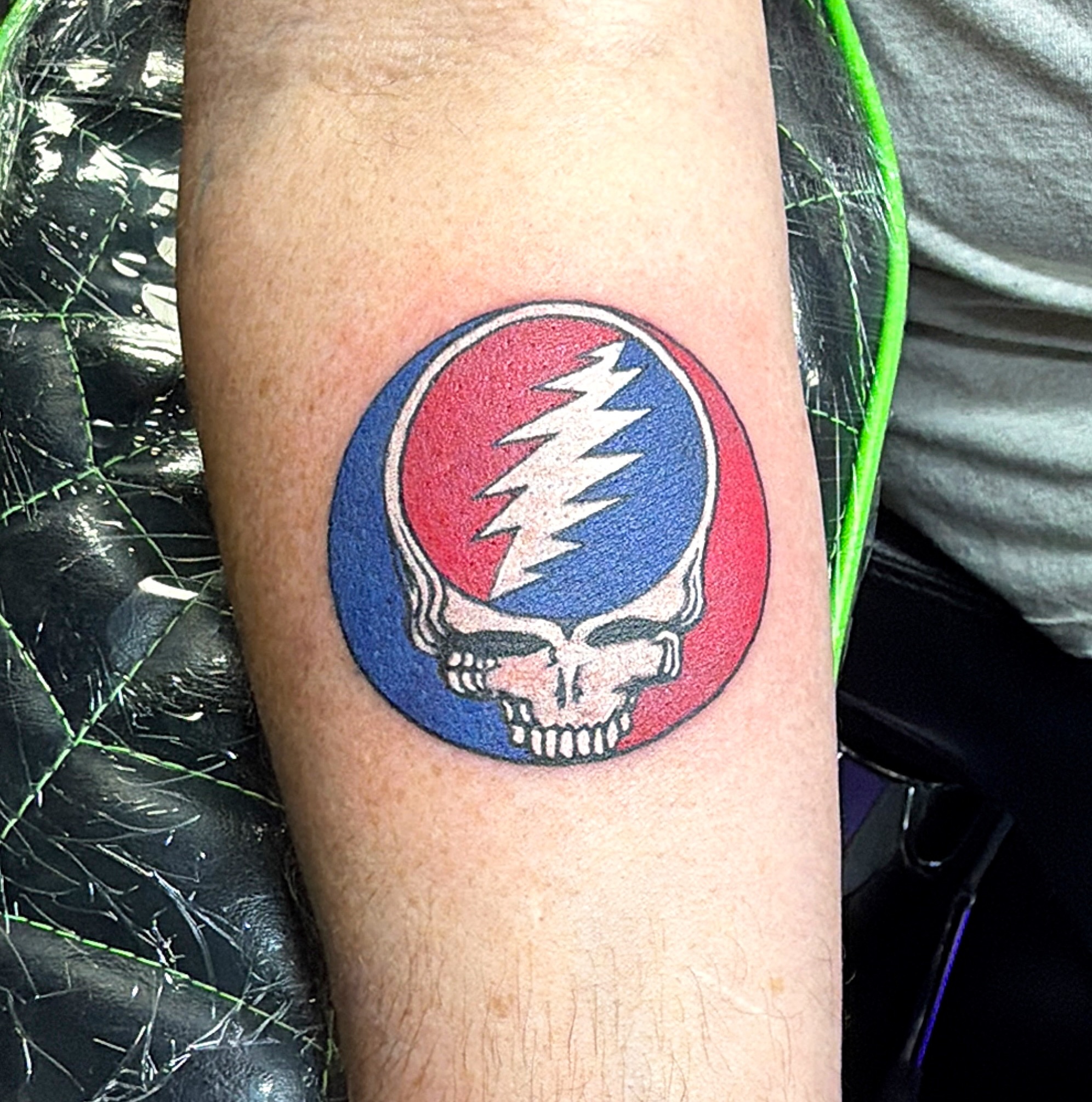 Steal your face American traditional tattoo on the forearm by Stephanie Comito-Stephens
