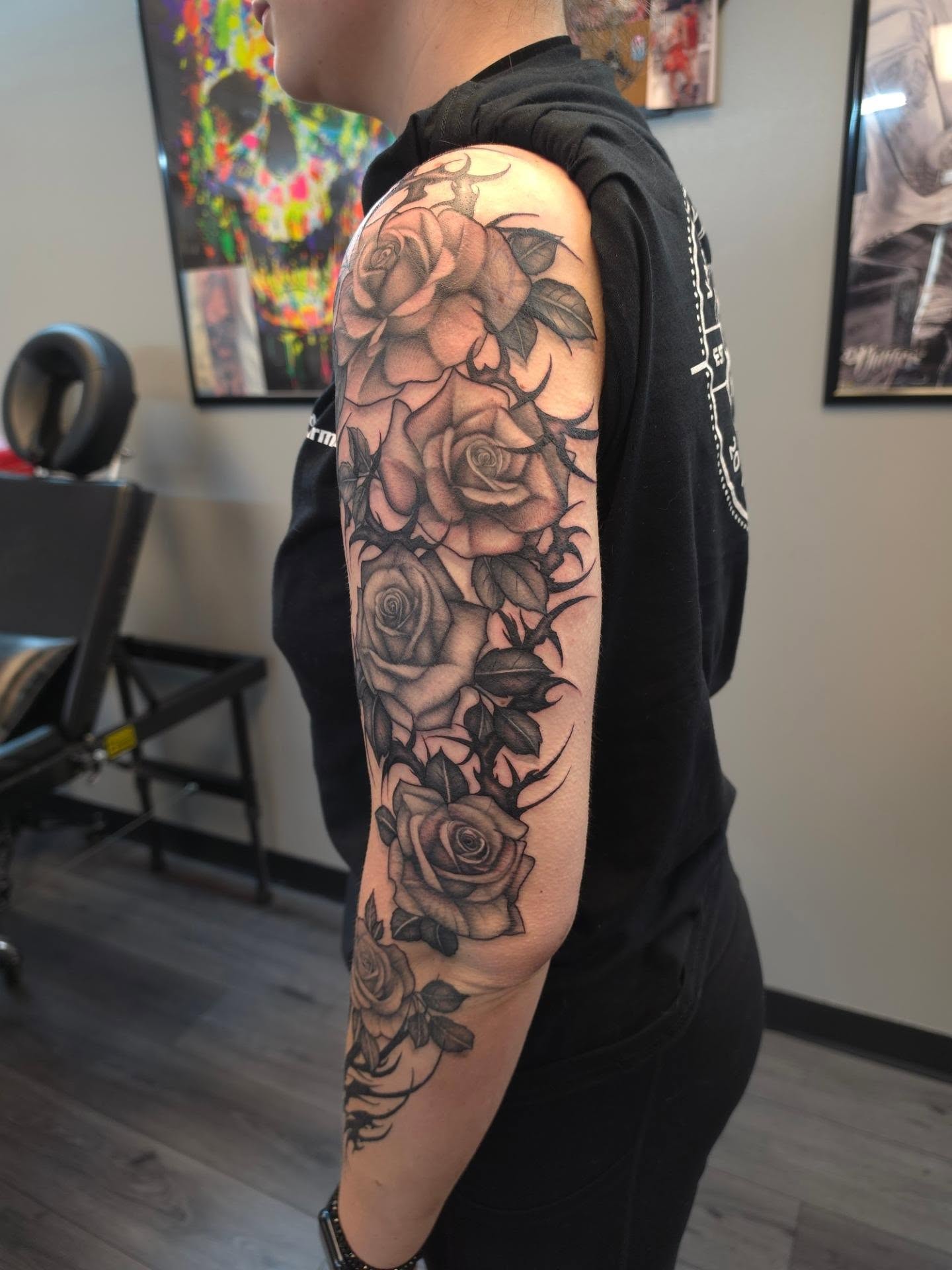 Roses black and grey tattoo on the forearm by Danielle Elizabeth