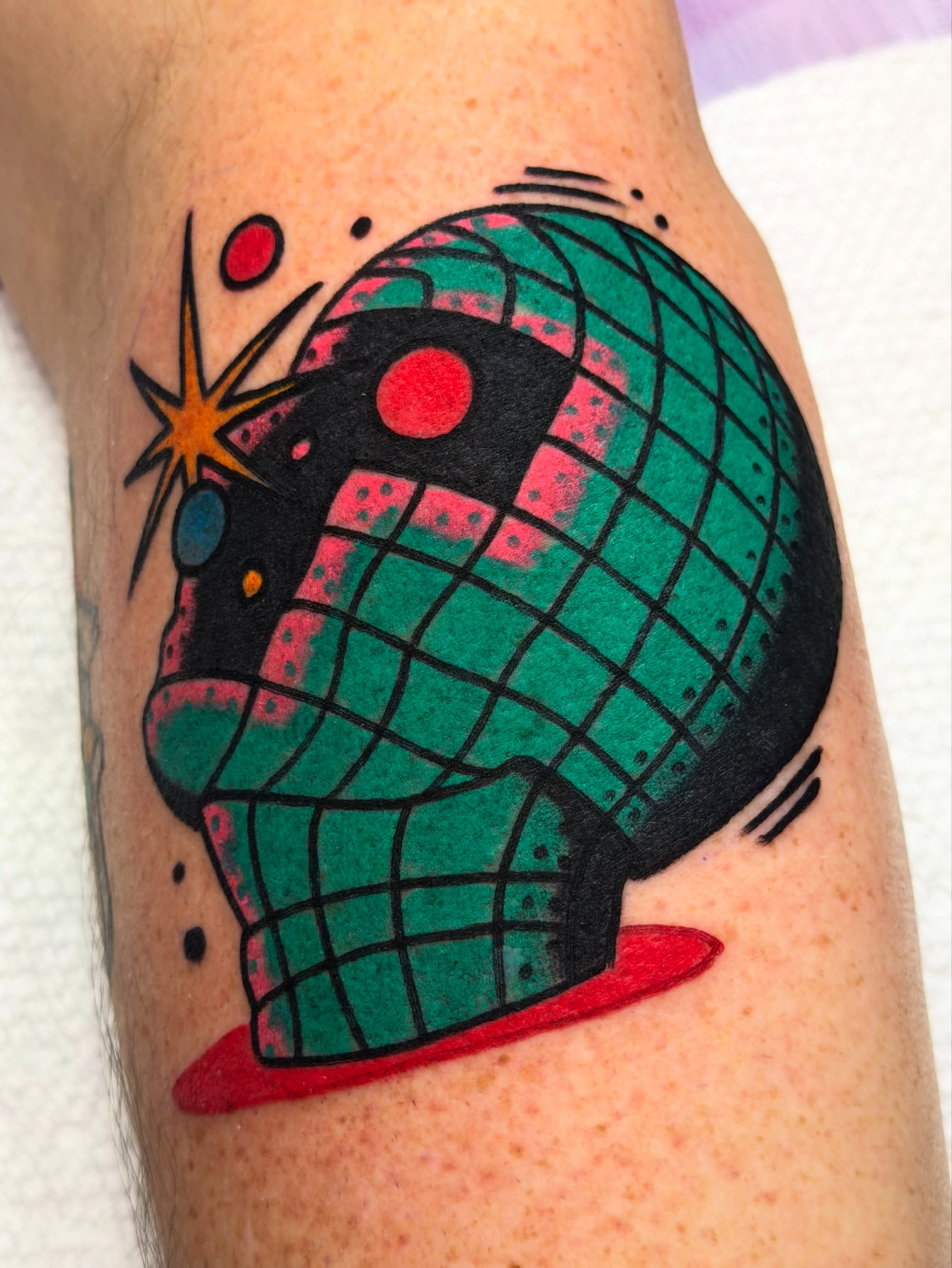 Geometric globe geometric tattoo on the forearm by Jacob, Marion, Illinois