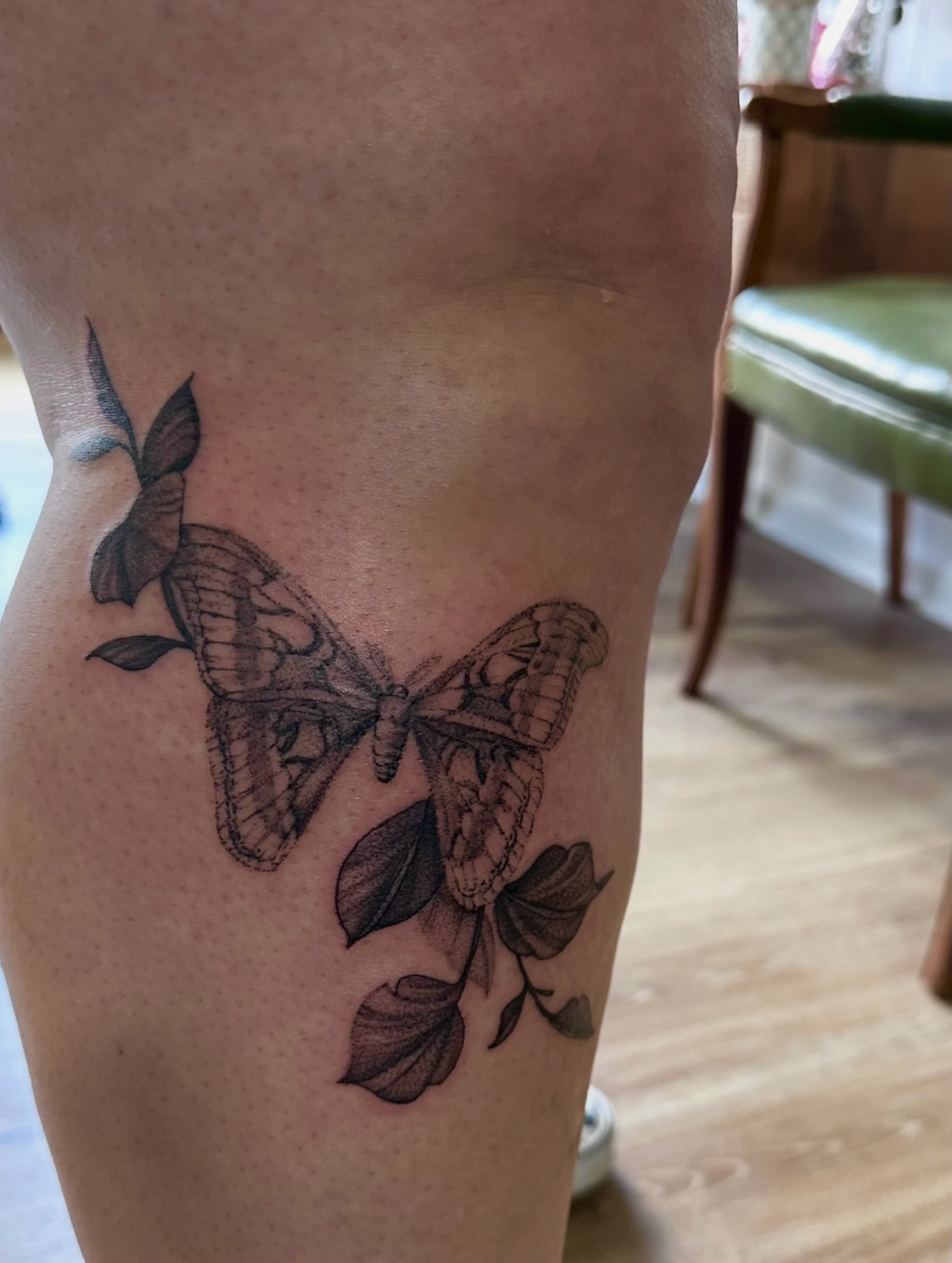 Butterfly black and grey tattoo on the thigh by Allexis
