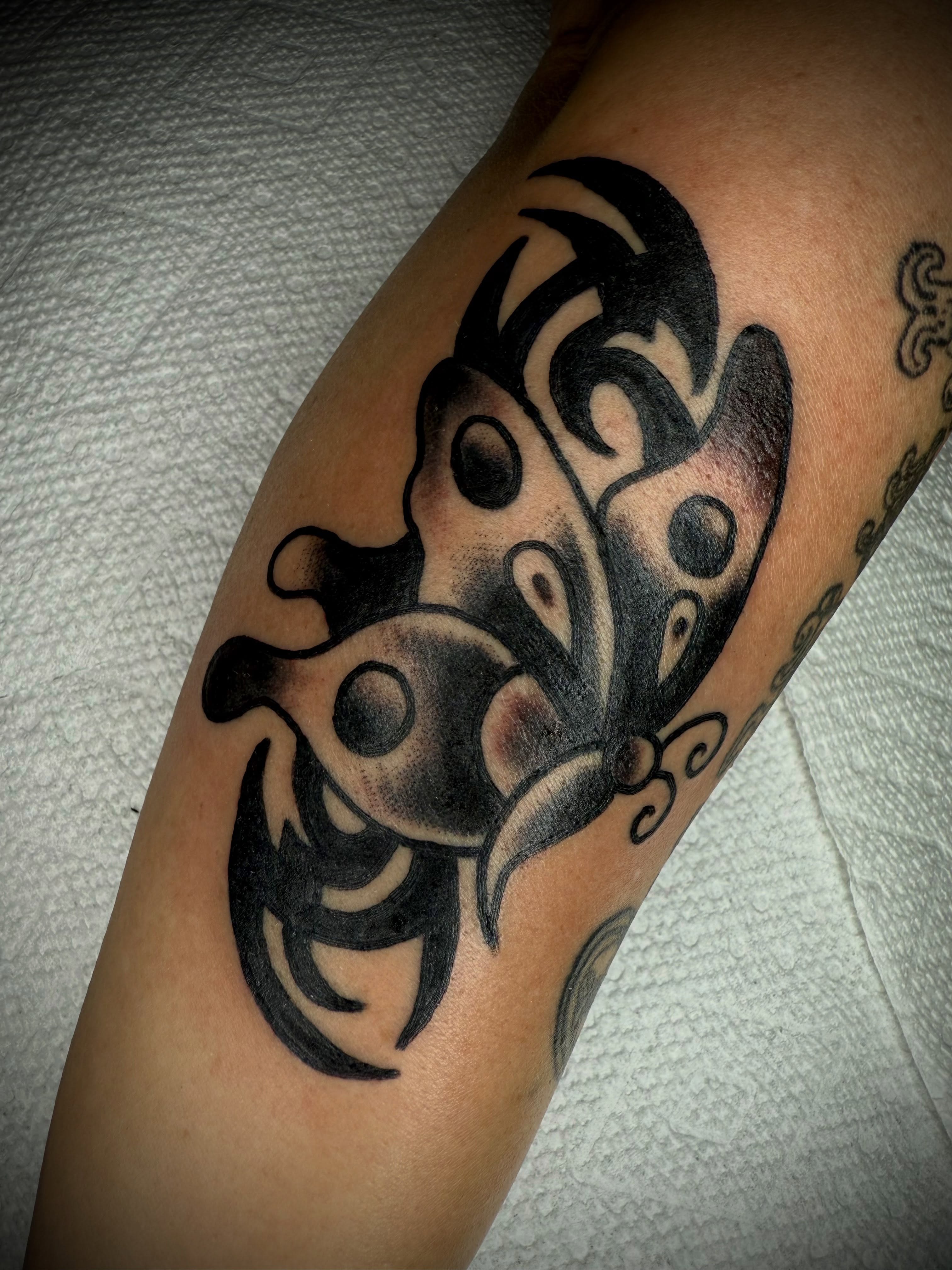 Tribal butterfly tribal tattoo on the forearm by Victoria Lagano NYC Traditional Tattoos