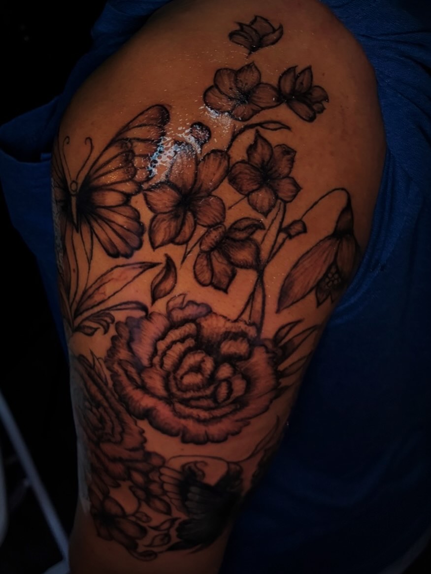 Flower bouquet realism tattoo on the shoulder by Ink’d by Reina 🖤, Colorado Springs, Colorado