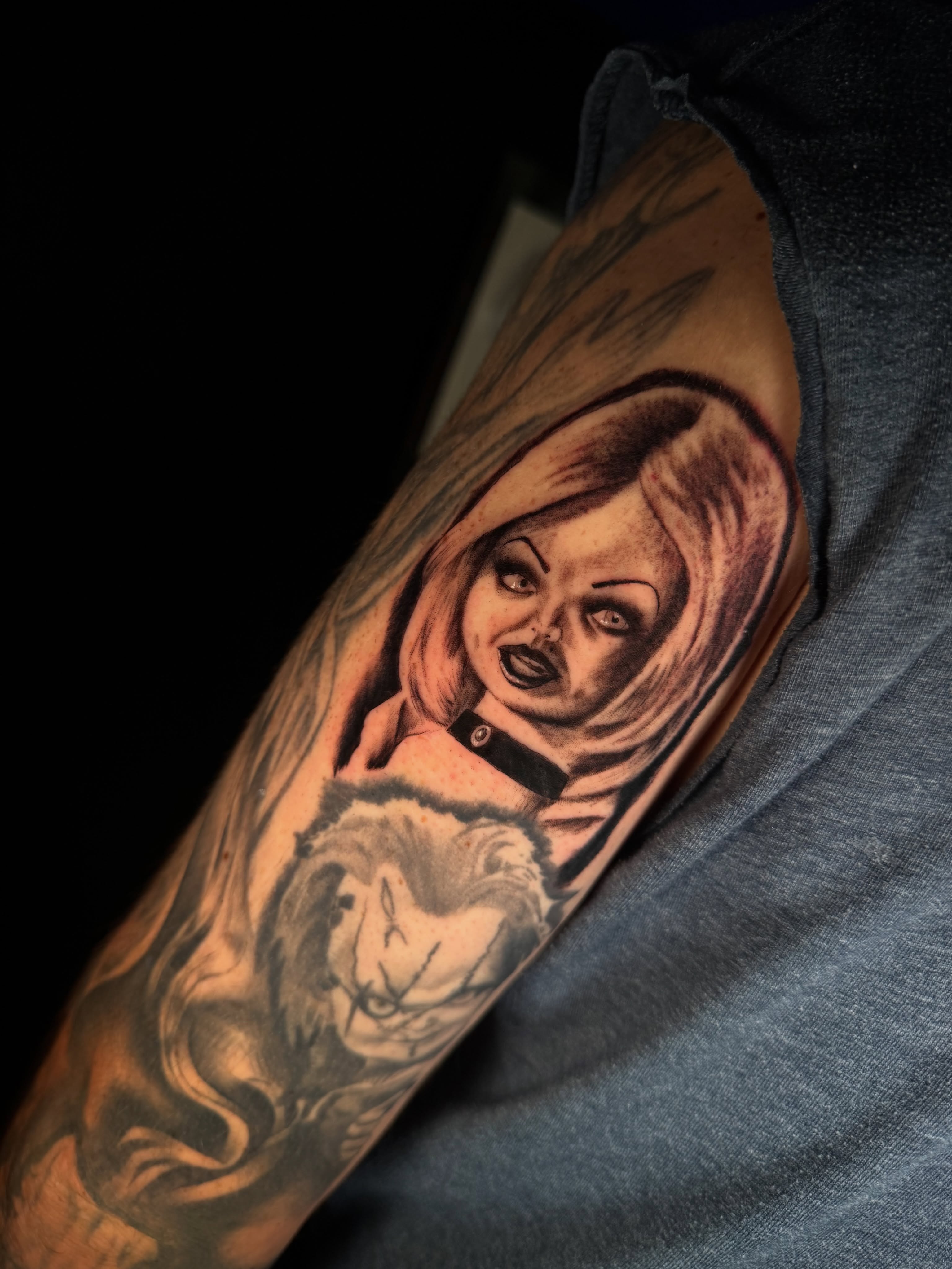 Doll realism tattoo on the forearm by Monica Gonzalez