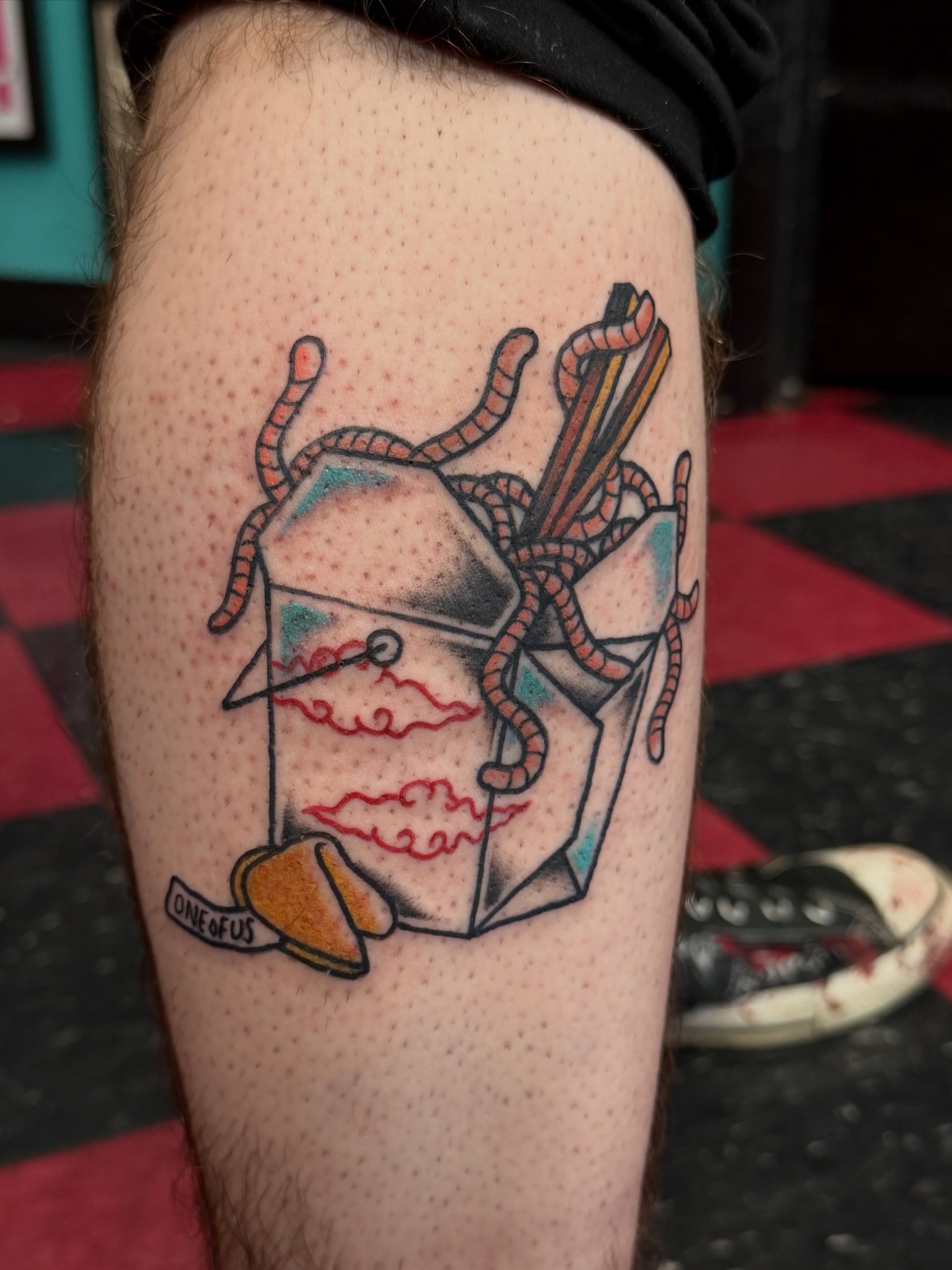 Chinese takeout box with noodles American traditional tattoo on the forearm by Patrick Miller, Huber Heights, Ohio