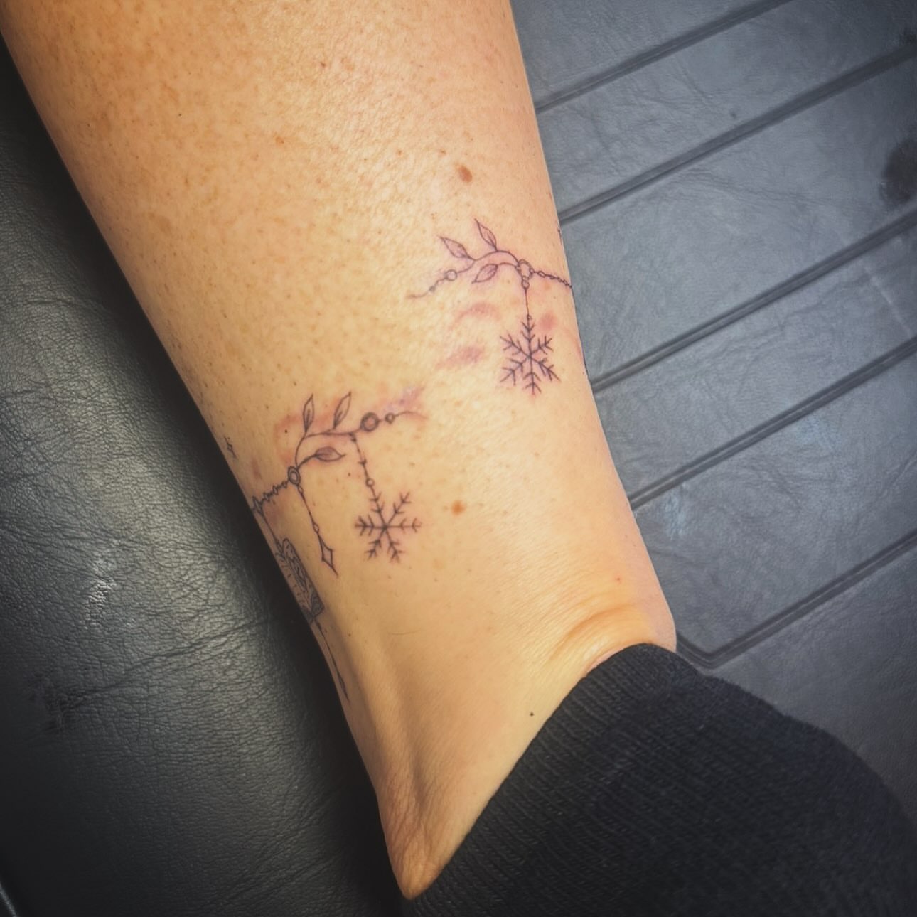 Tattoo by @evolveink.tattoos — fine_line, black_and_grey