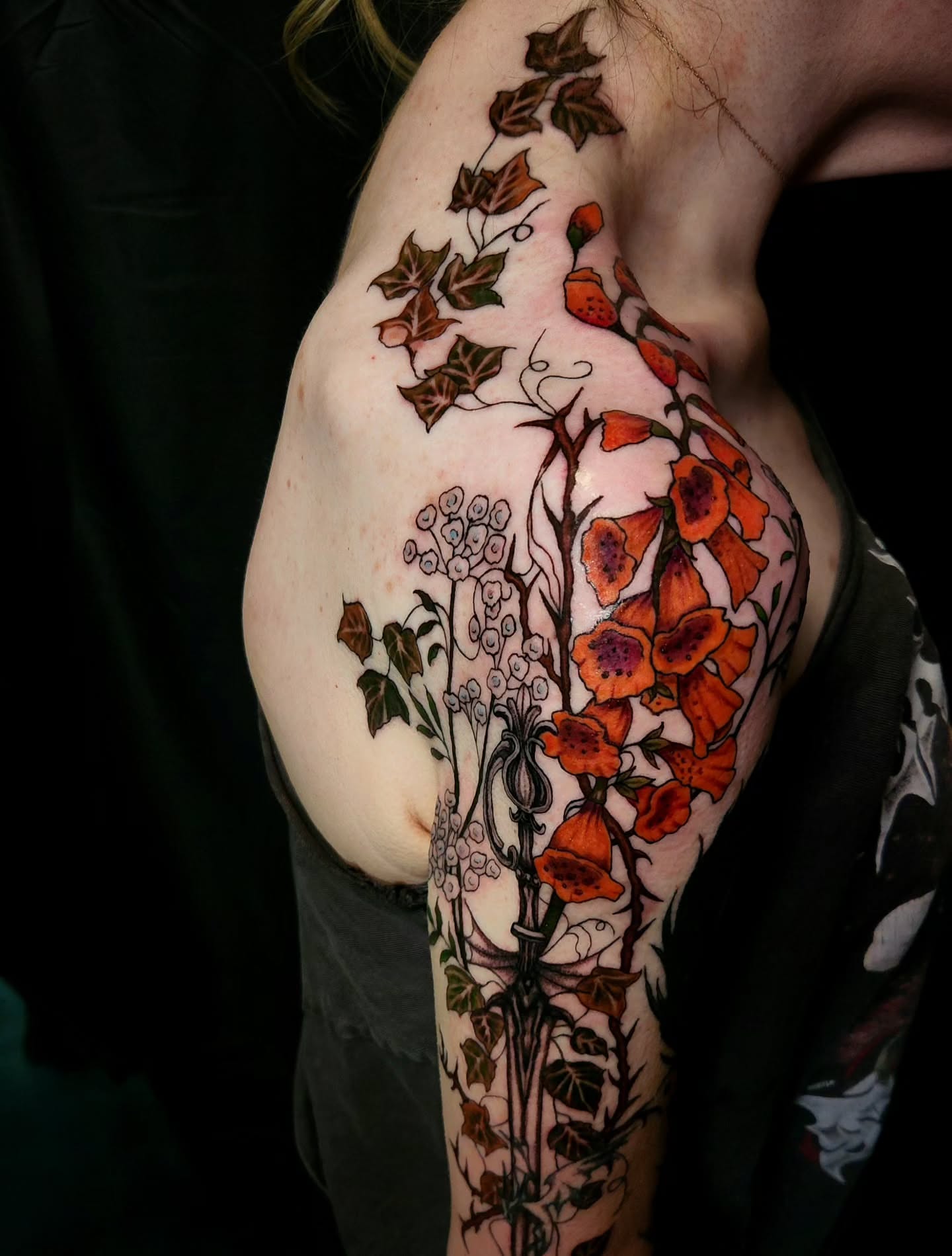 Floral vine new school tattoo on the shoulder by Ashly Renee