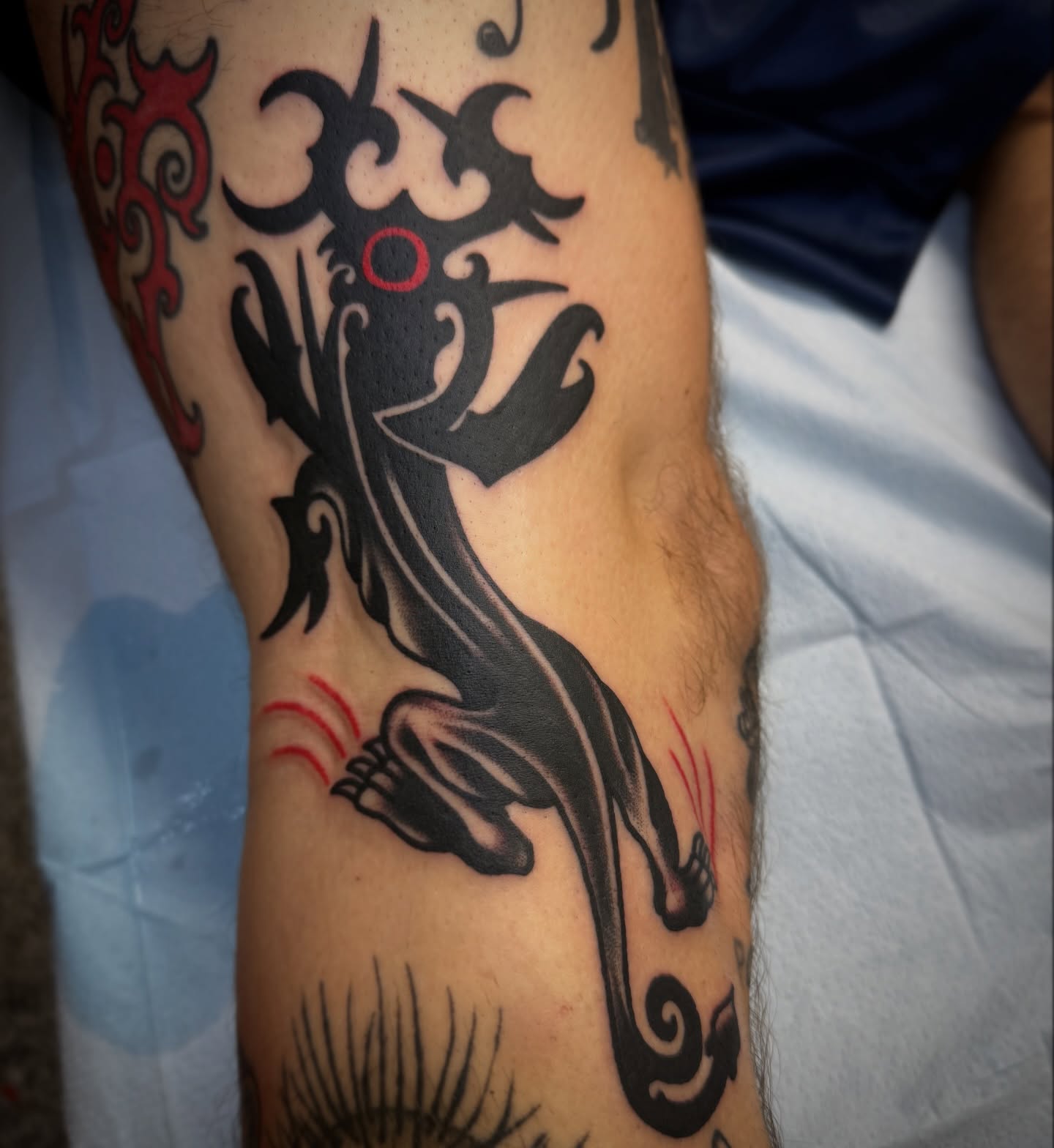 Lizard tribal tattoo on the forearm by Chuck Paprocki, Nashville, Tennessee