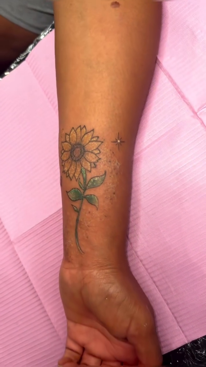 Sunflower fine line tattoo by Felicia Lee, Des Moines, Iowa